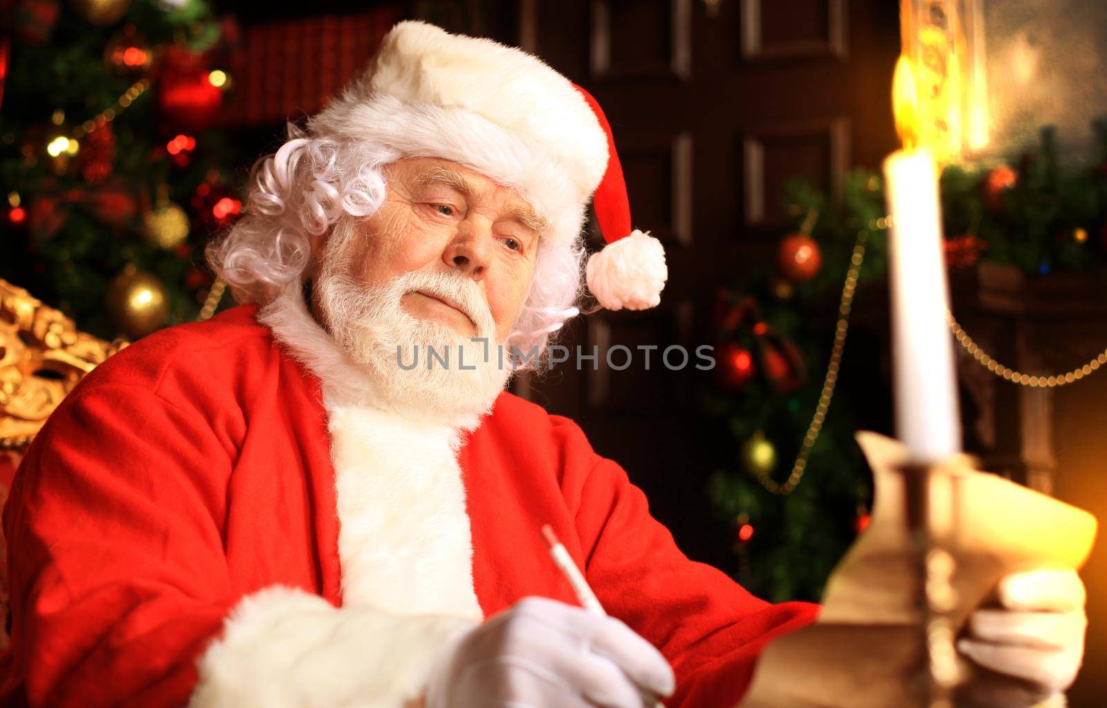 Portrait of Santa Claus answering Christmas letters.