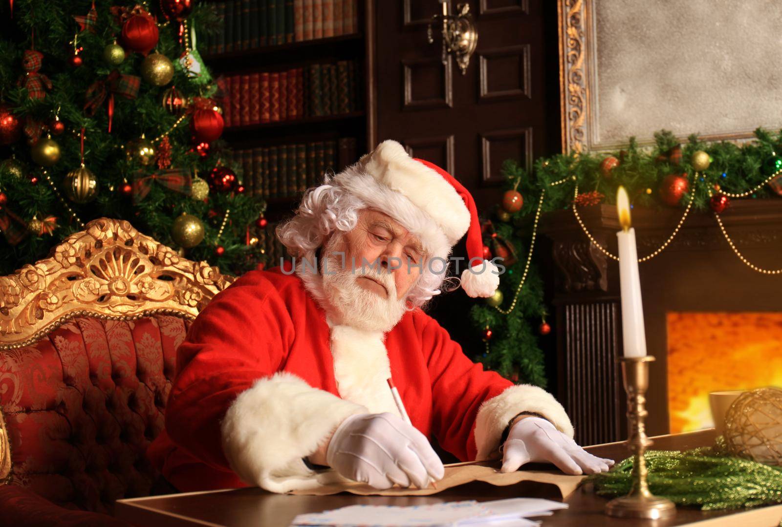 Portrait of Santa Claus answering Christmas letters. by tsyhun