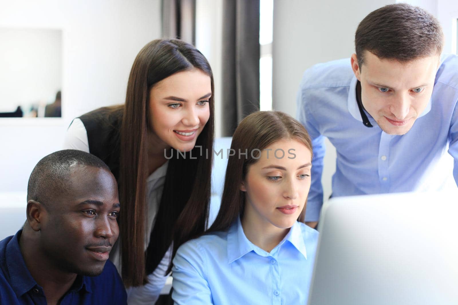 Coworking process, designers team work project. Photo young business crew working with new startup modern office