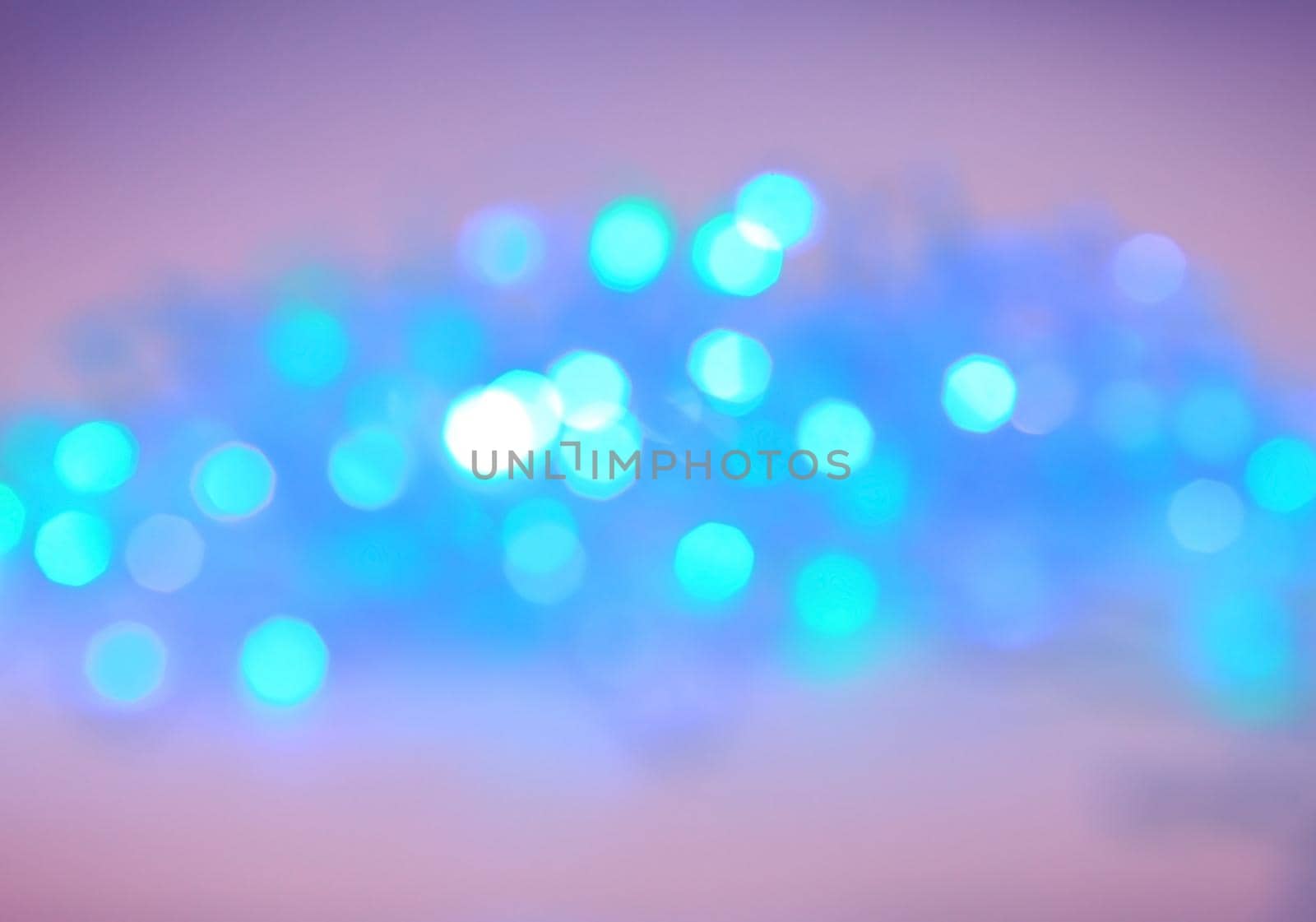 festive blurred background with bright blue lights.photo with copy space