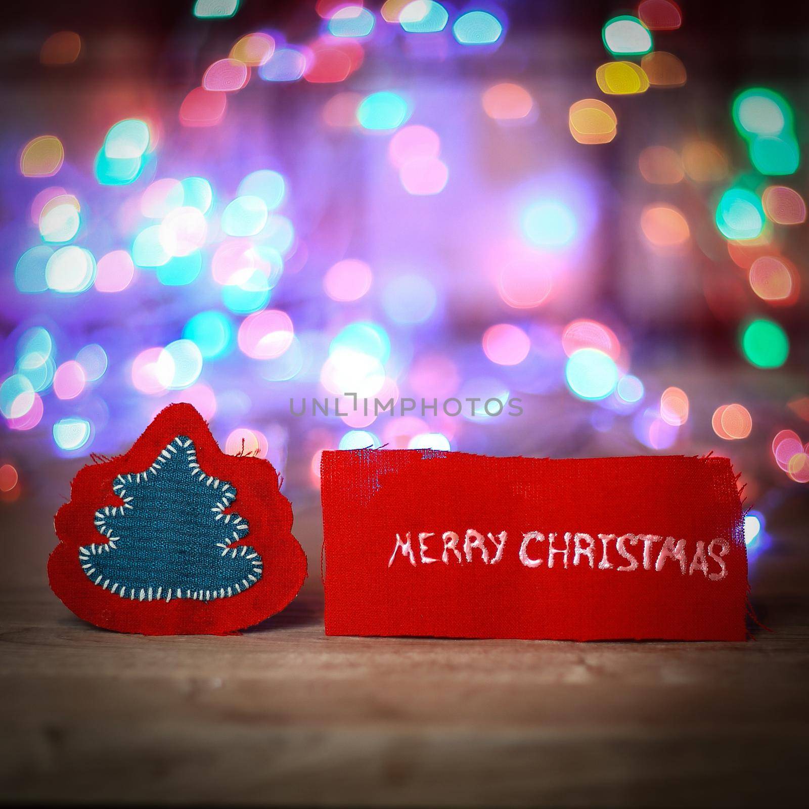 inscription merry Christmas on a festive blurred background . by SmartPhotoLab