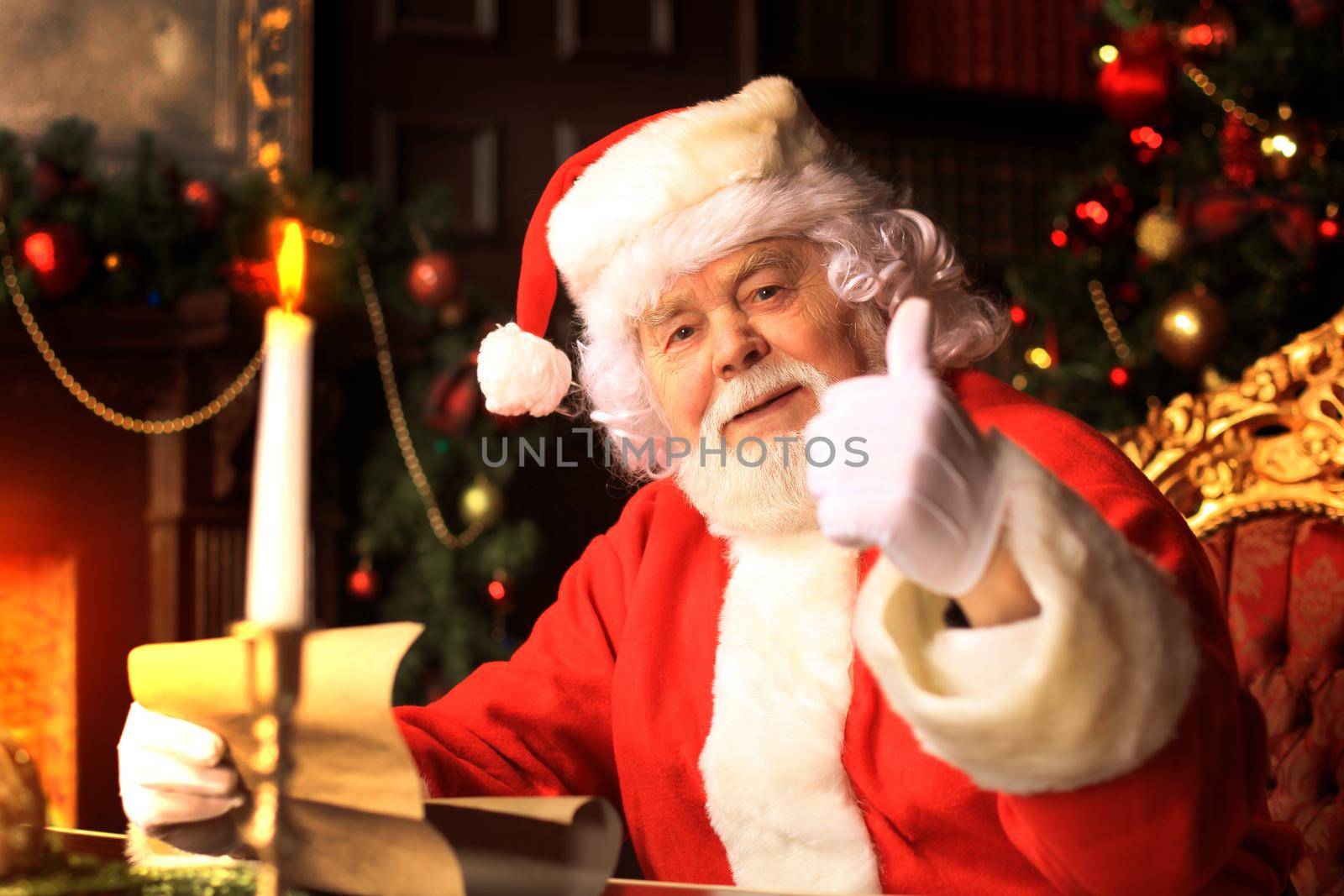 Santa Claus standing with thumbs up. Home decoration. by tsyhun