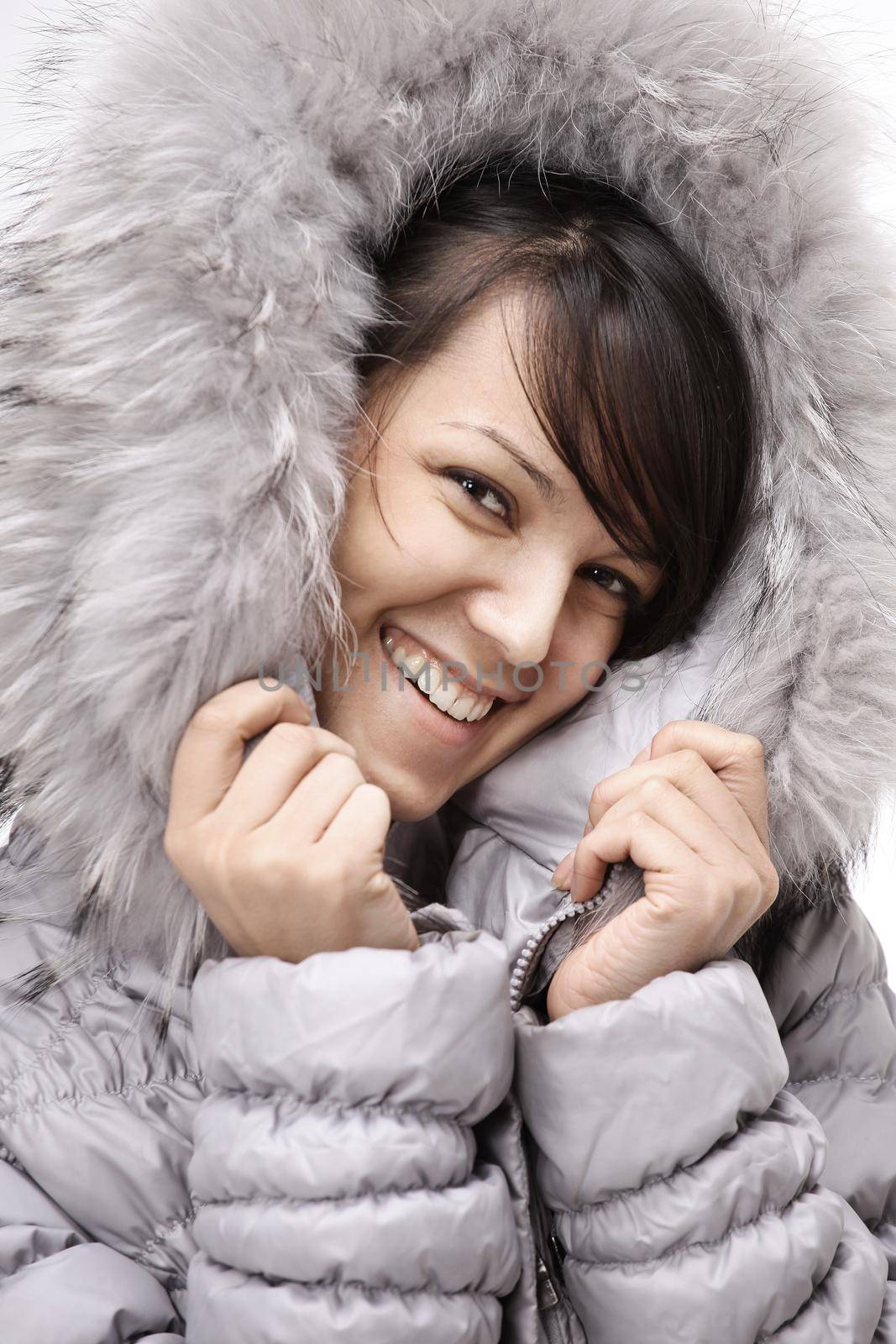 closeup.portrait of beautiful young woman in winter jacket