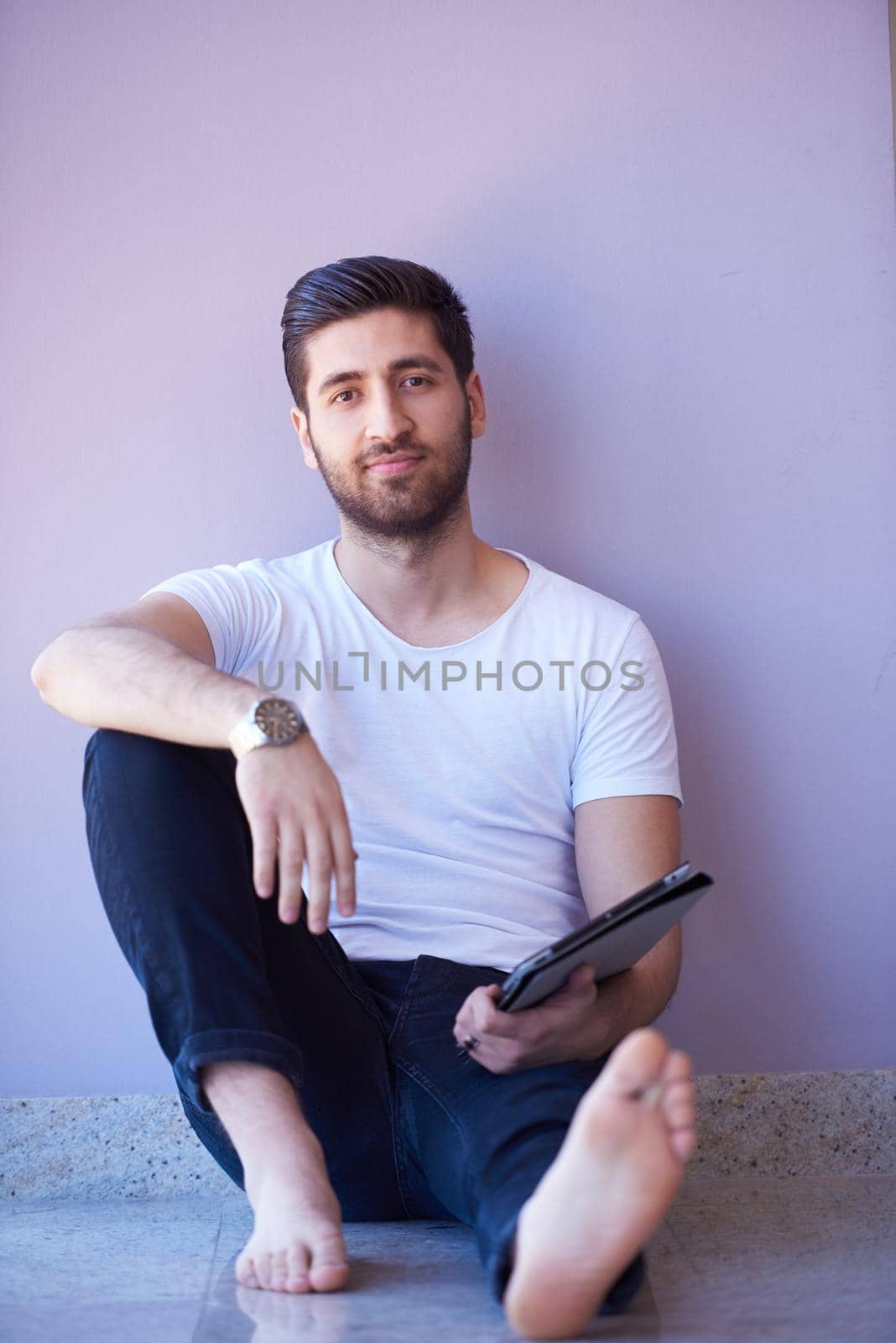 student working on tablet computer at university school modern interior