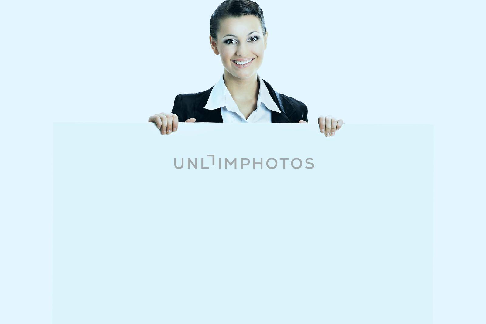 Beautiful business woman with a white banner. Isolated on white background. by SmartPhotoLab