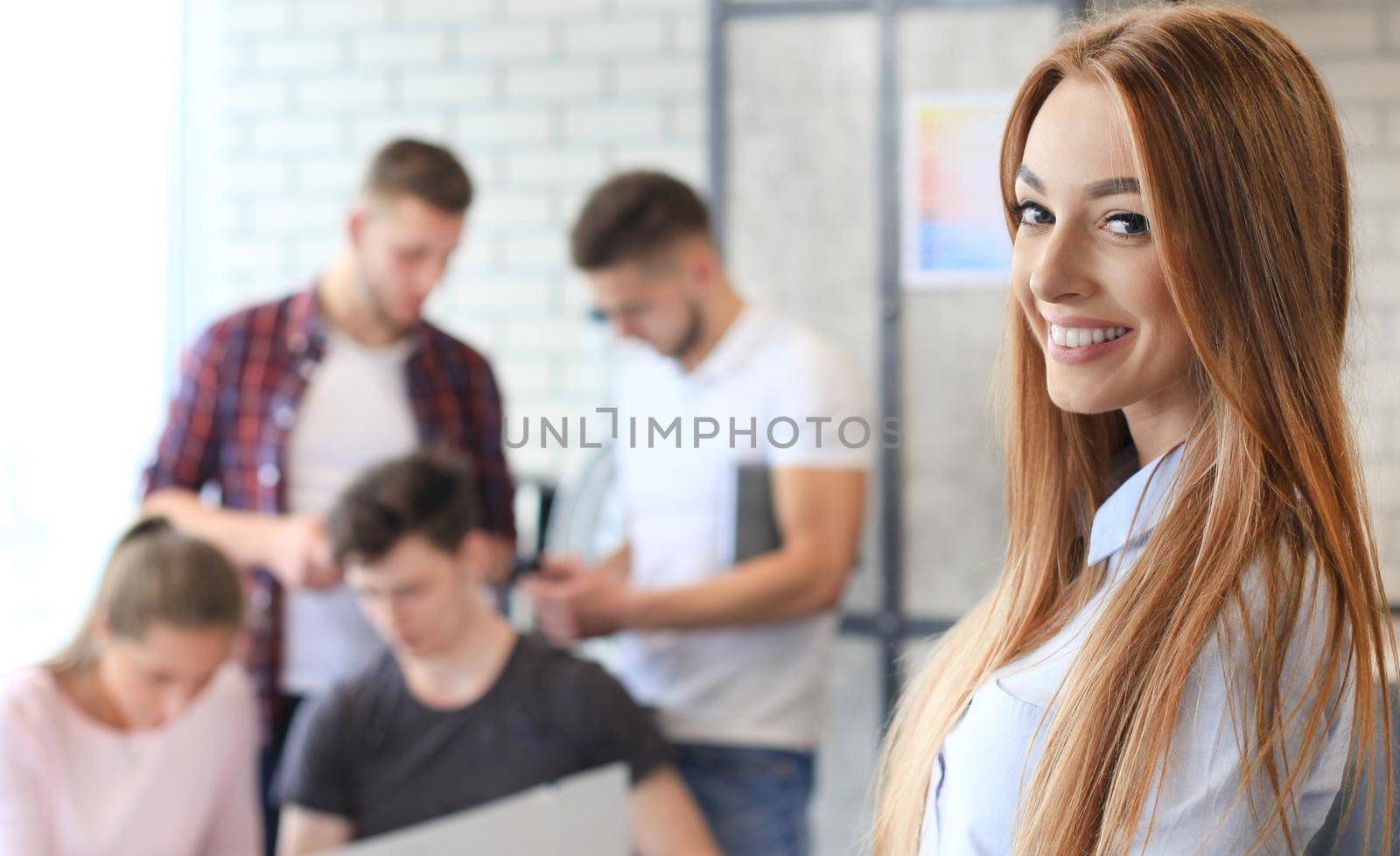 Modern business woman in the office with copy space by tsyhun