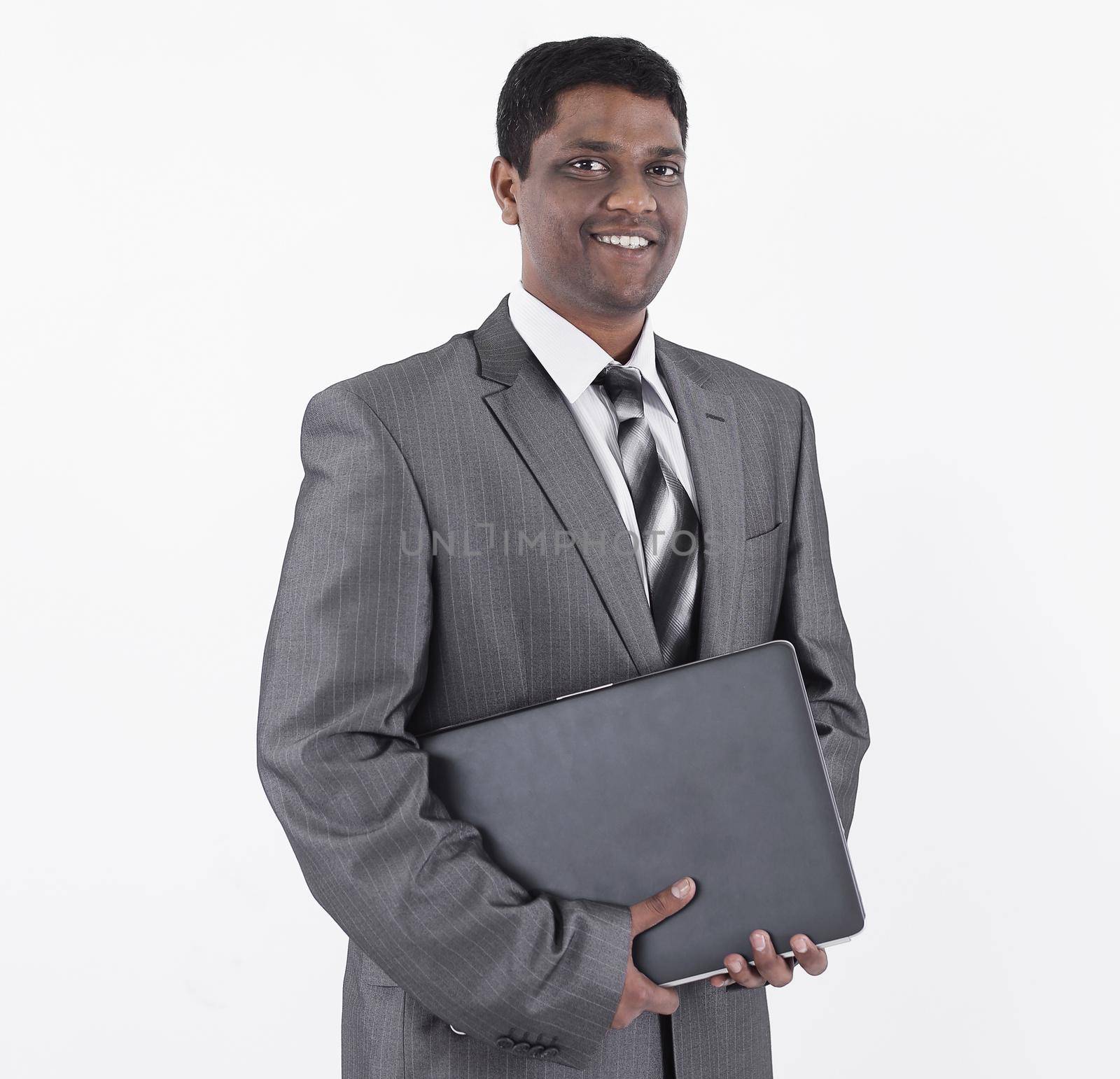 handsome businessman with a laptop .isolated on white background