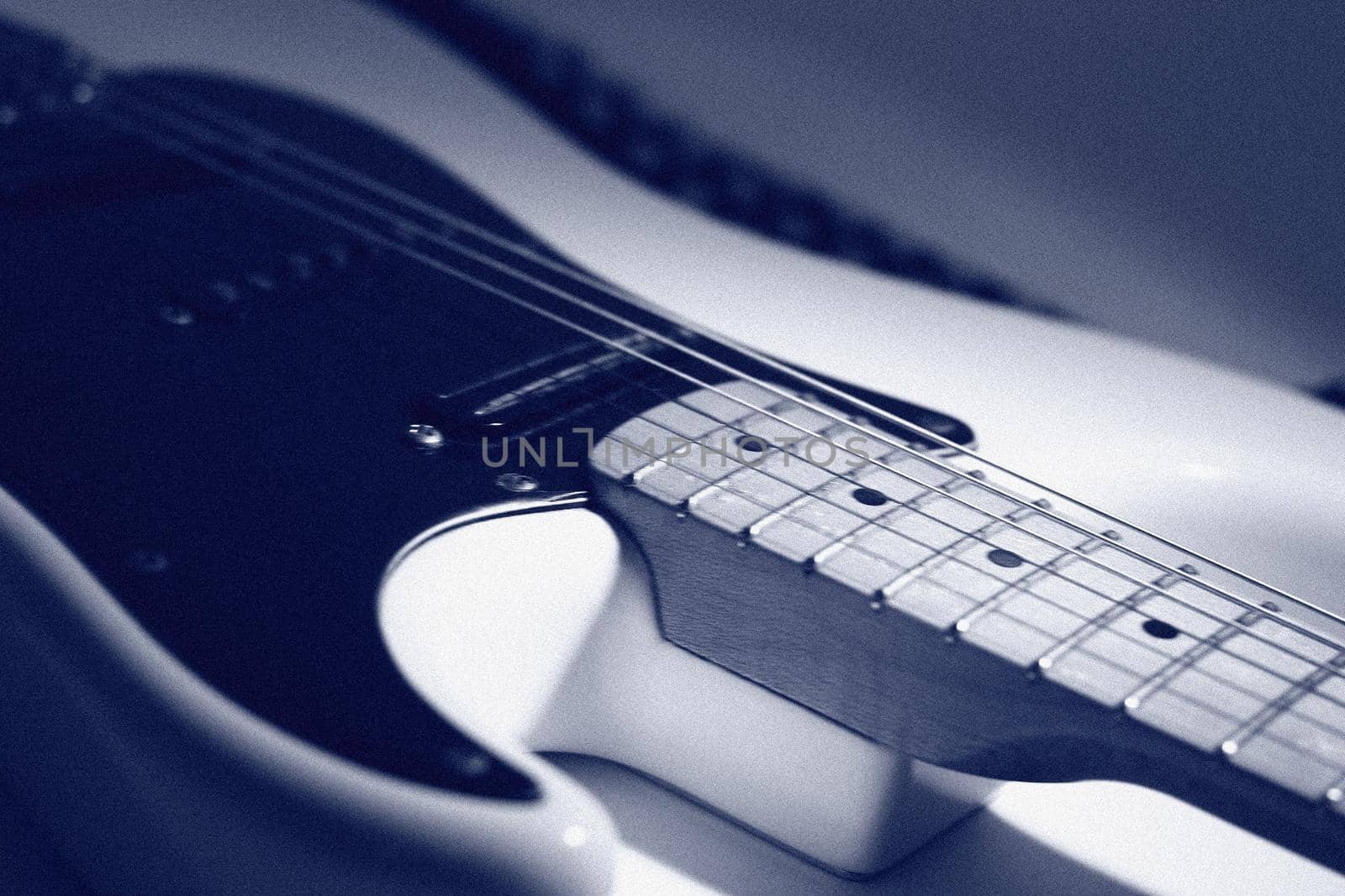 closeup.black electric guitar on white background. photo with copy space
