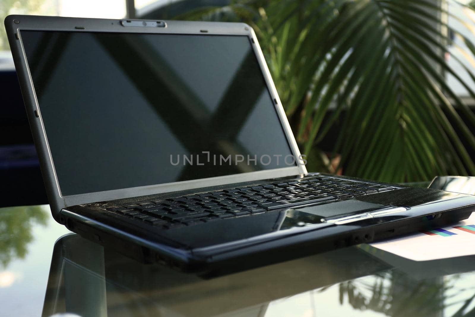 Closeup photo of laptop by SmartPhotoLab