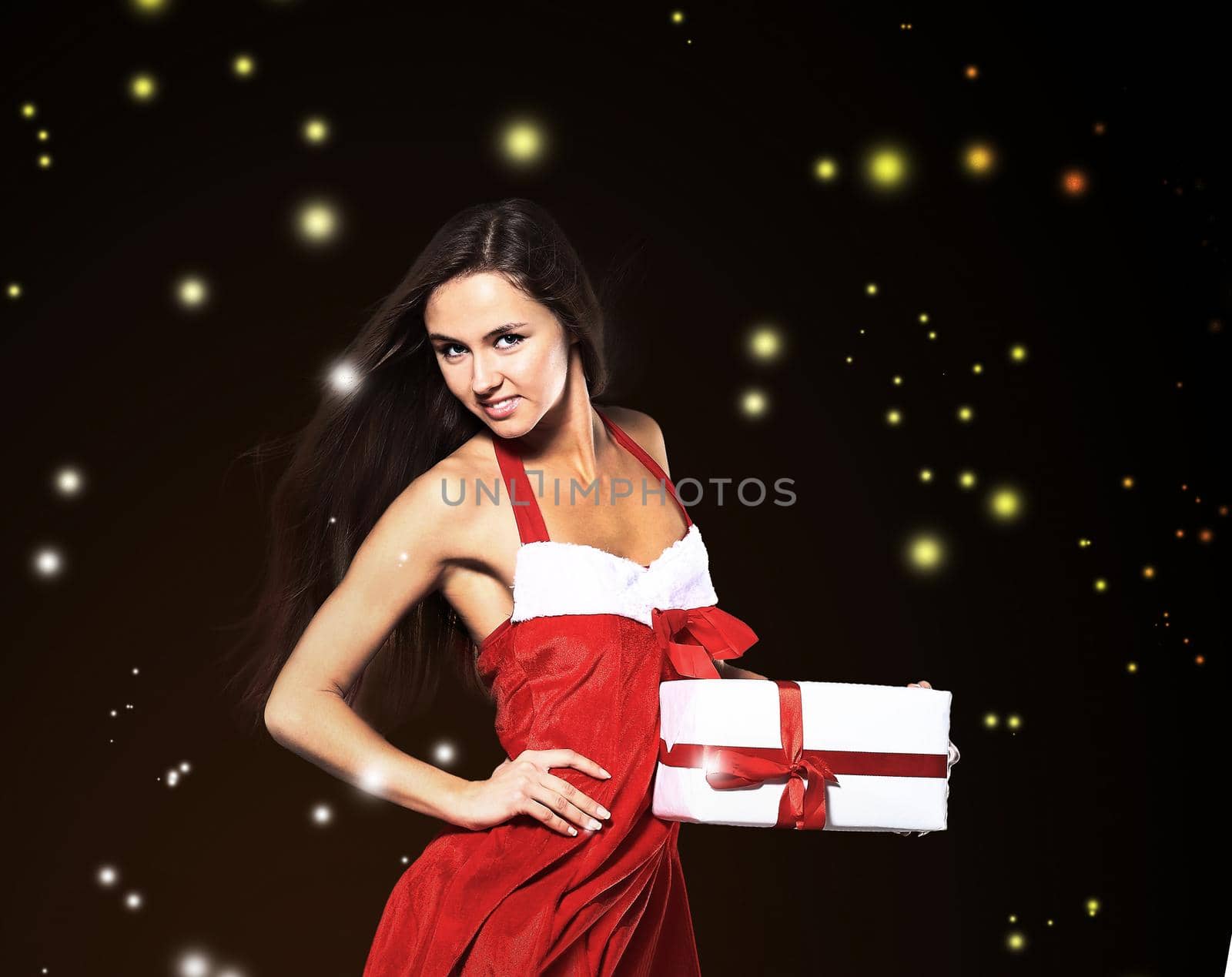 woman in costume of Santa Claus on a dark Christmas background.photo with copy space