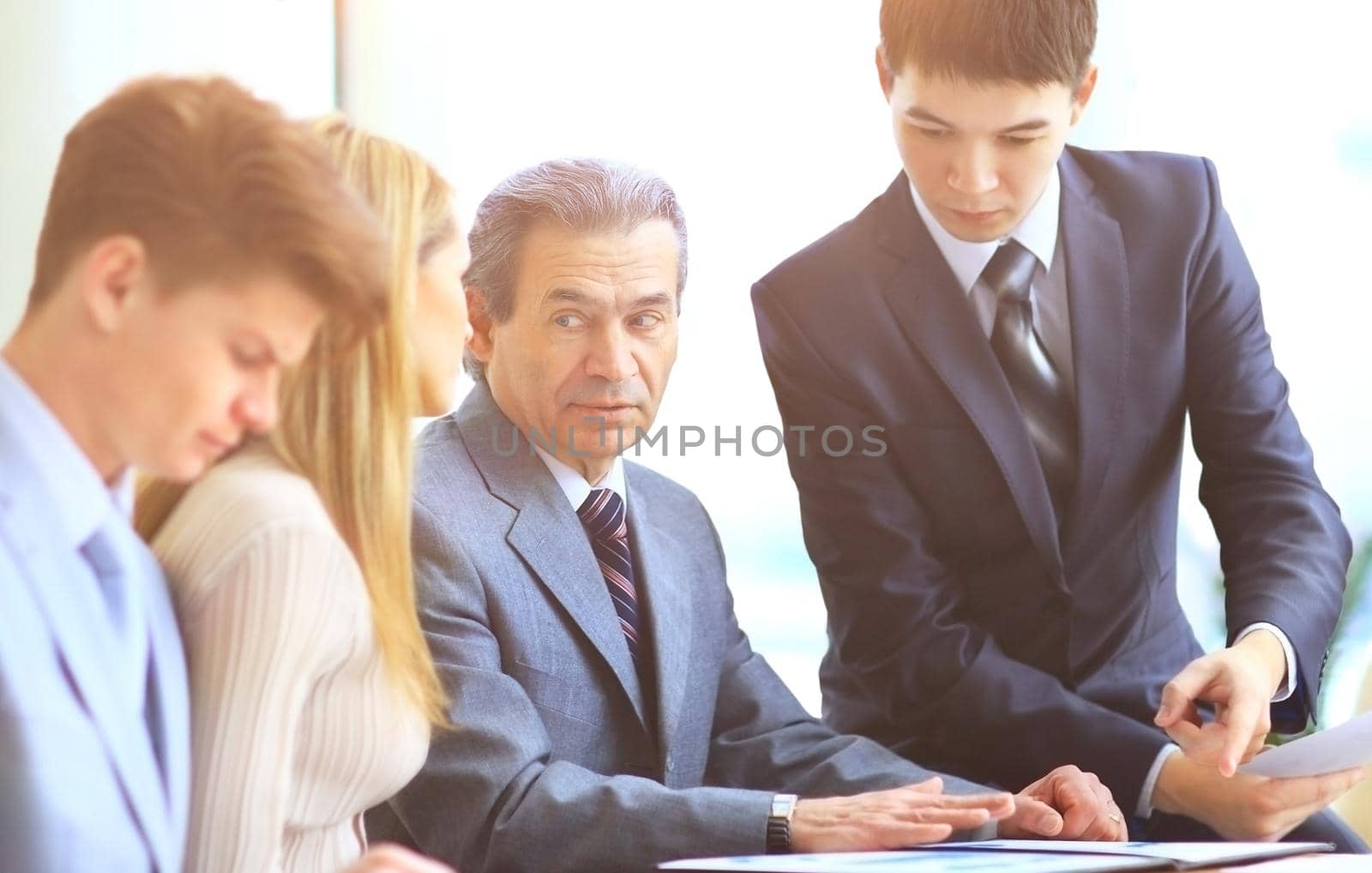 Business team working on their business project together at office