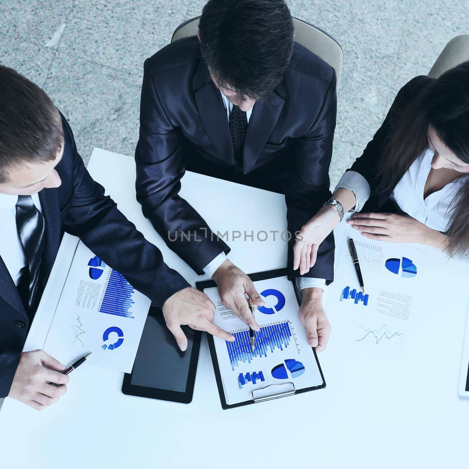 friendly business team having meeting in the office by SmartPhotoLab