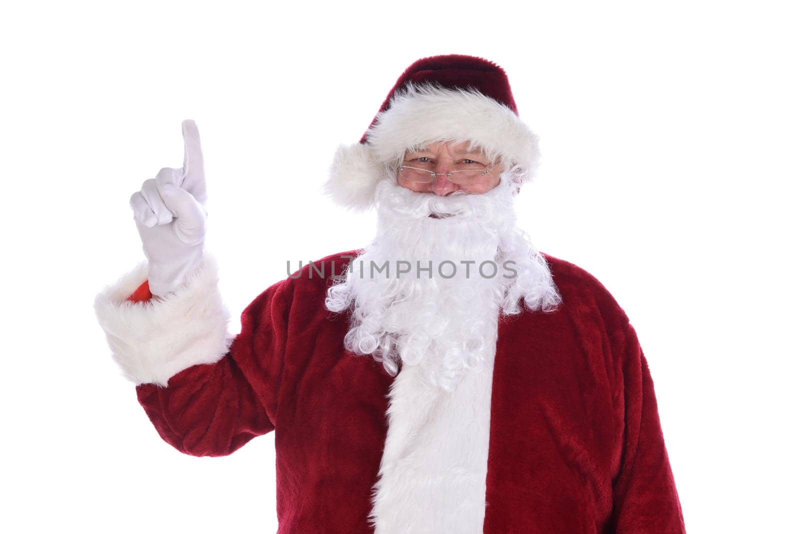 Santa Claus Pointing his index finger in the air - number 1 gesture.