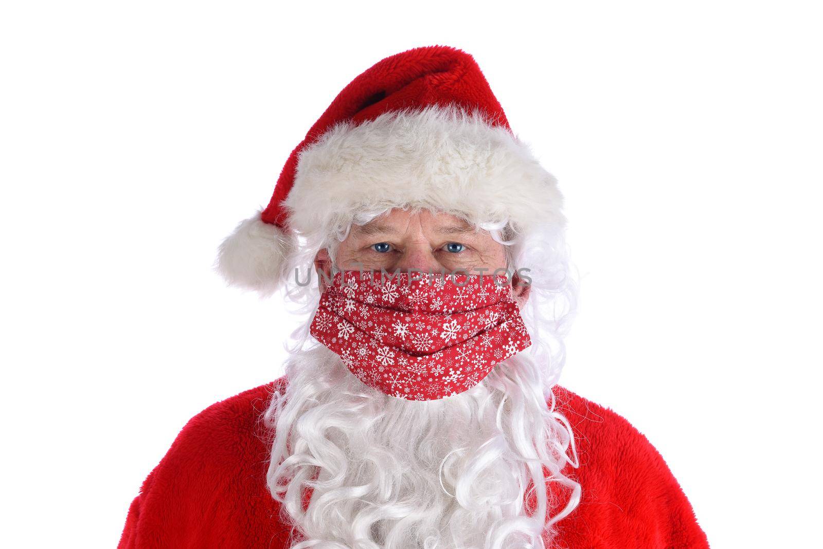 Portrait of Santa Claus wearing a homemade COVID-19 mask Mrs. Claus made for him. by sCukrov