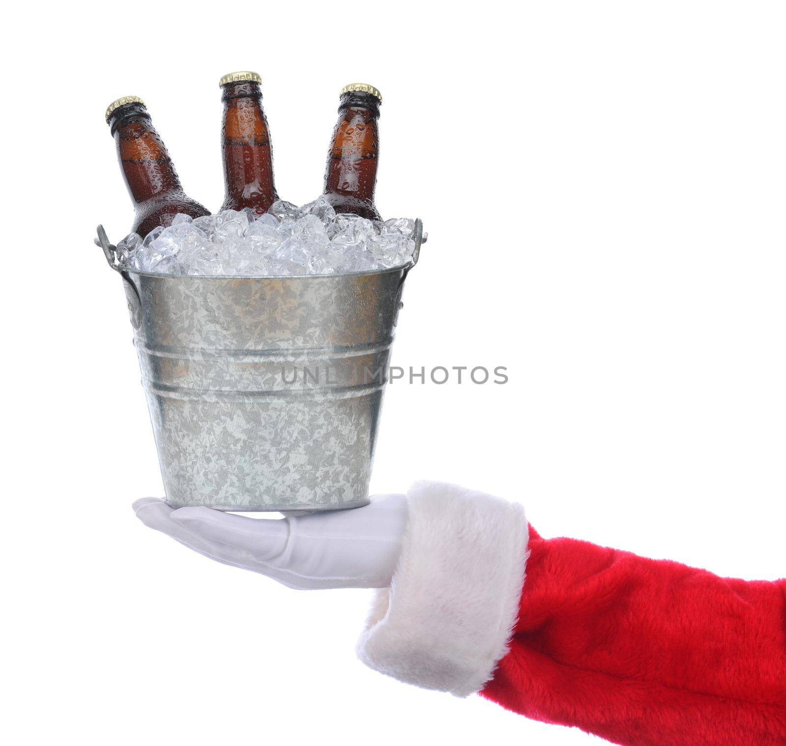 Santa Claus outstretched arm holding a bucket of beer in his hand. Square format over a white background.