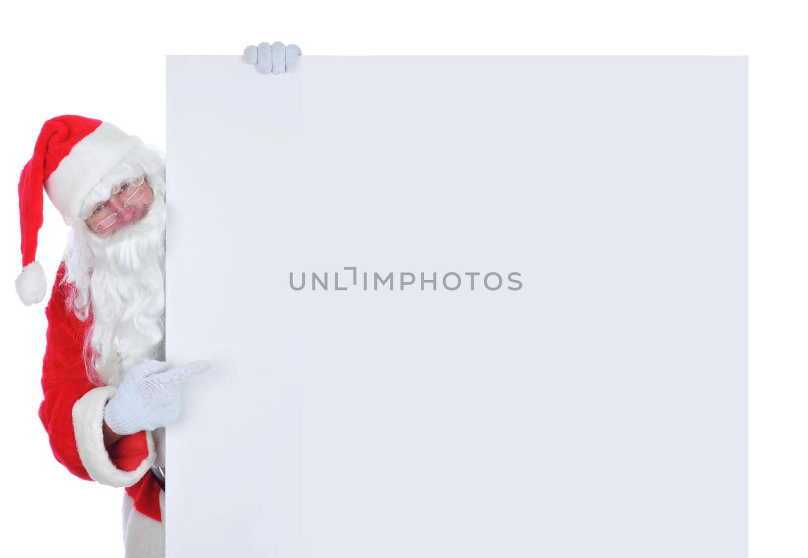 Santa Claus on the side of a wide blank poster pointing at the blank space by sCukrov