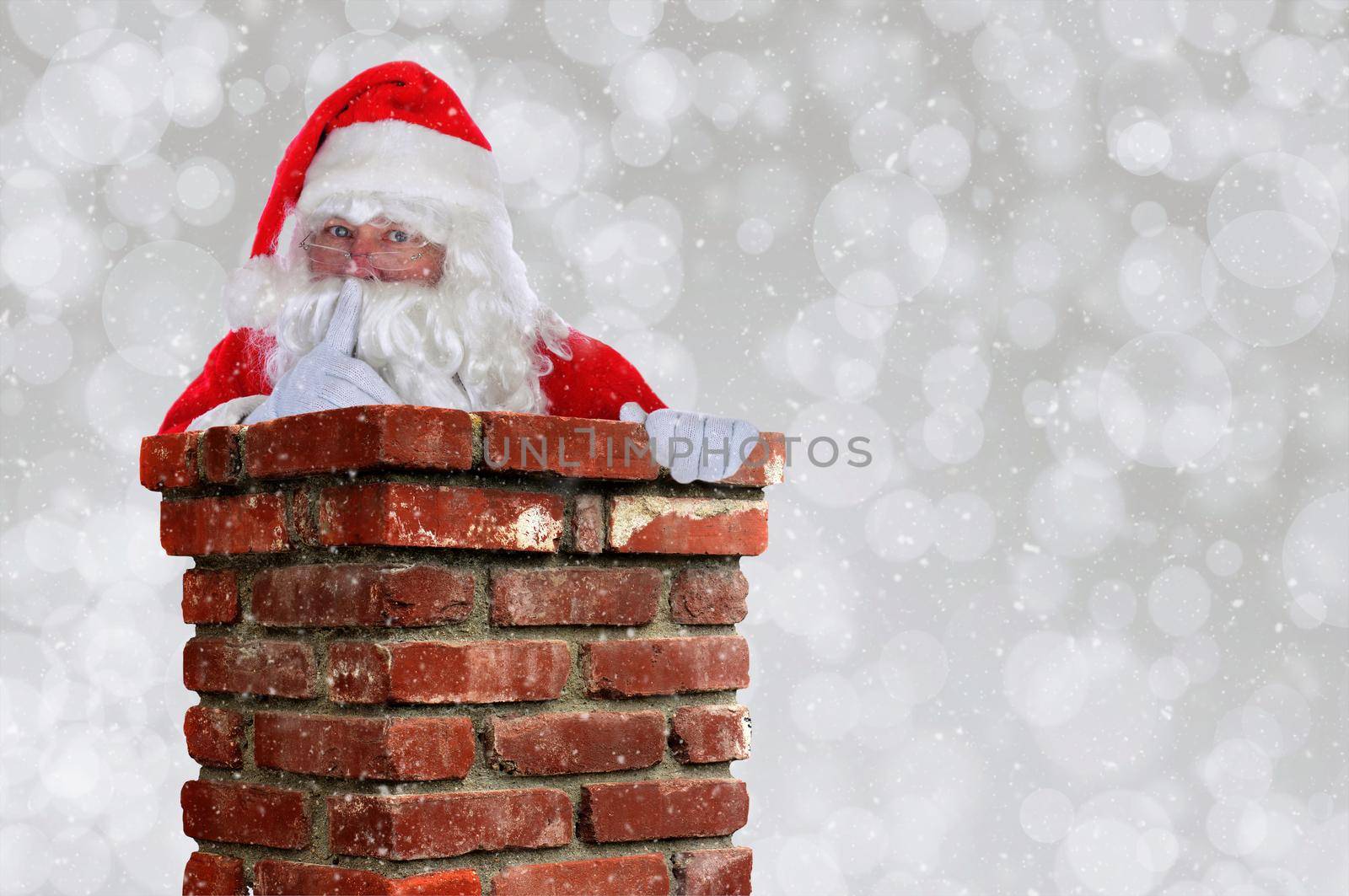 Santa Claus Going Down Chimney making Shh sign with finger to lips. by sCukrov