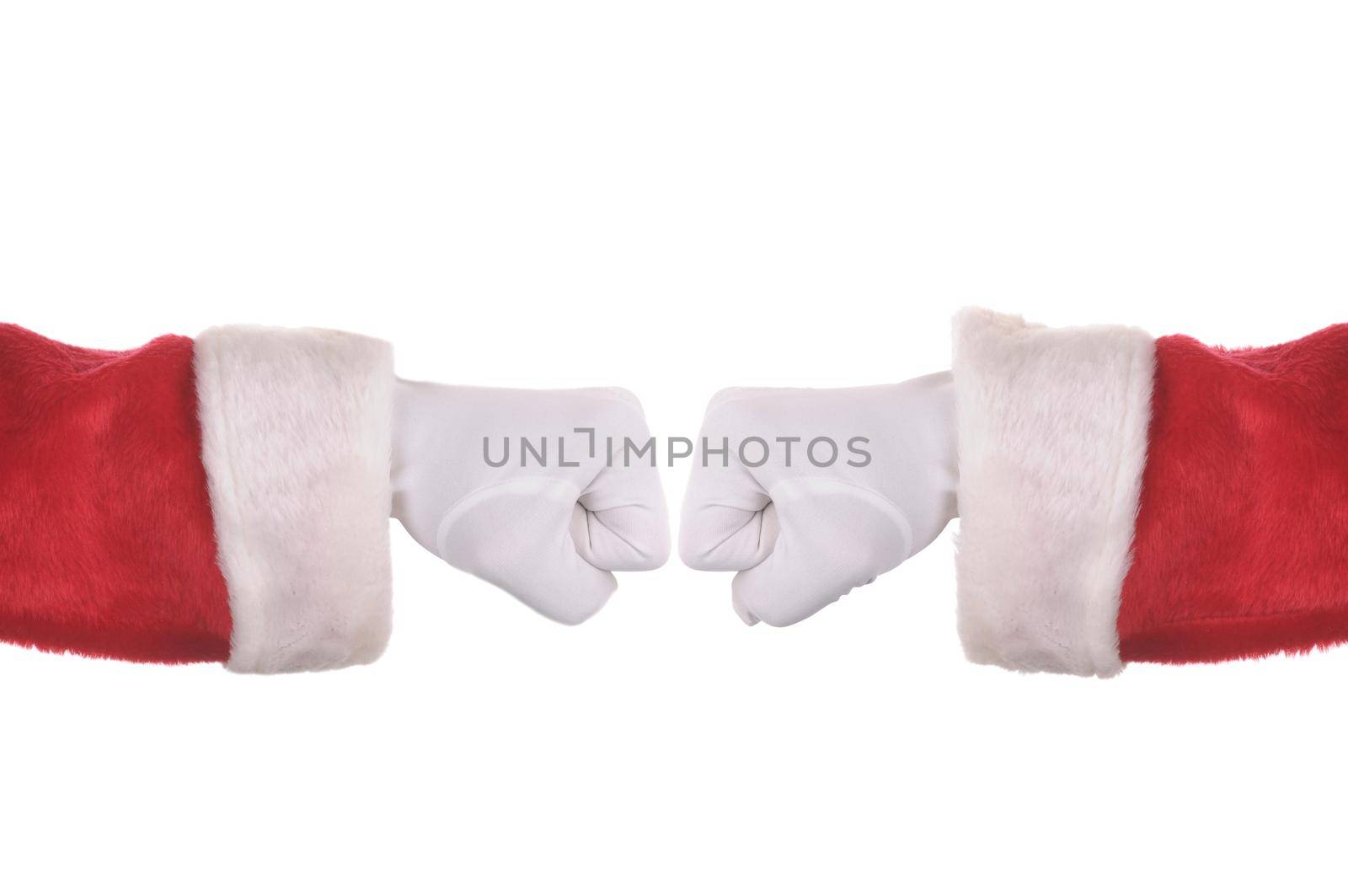 Closeup of two Santa Claus hands doing a fist bump, isolated on white.