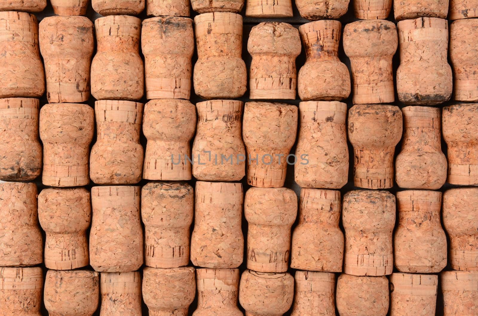 Closeup of a group of Champagne Corks. Horizontal format filling the frame.