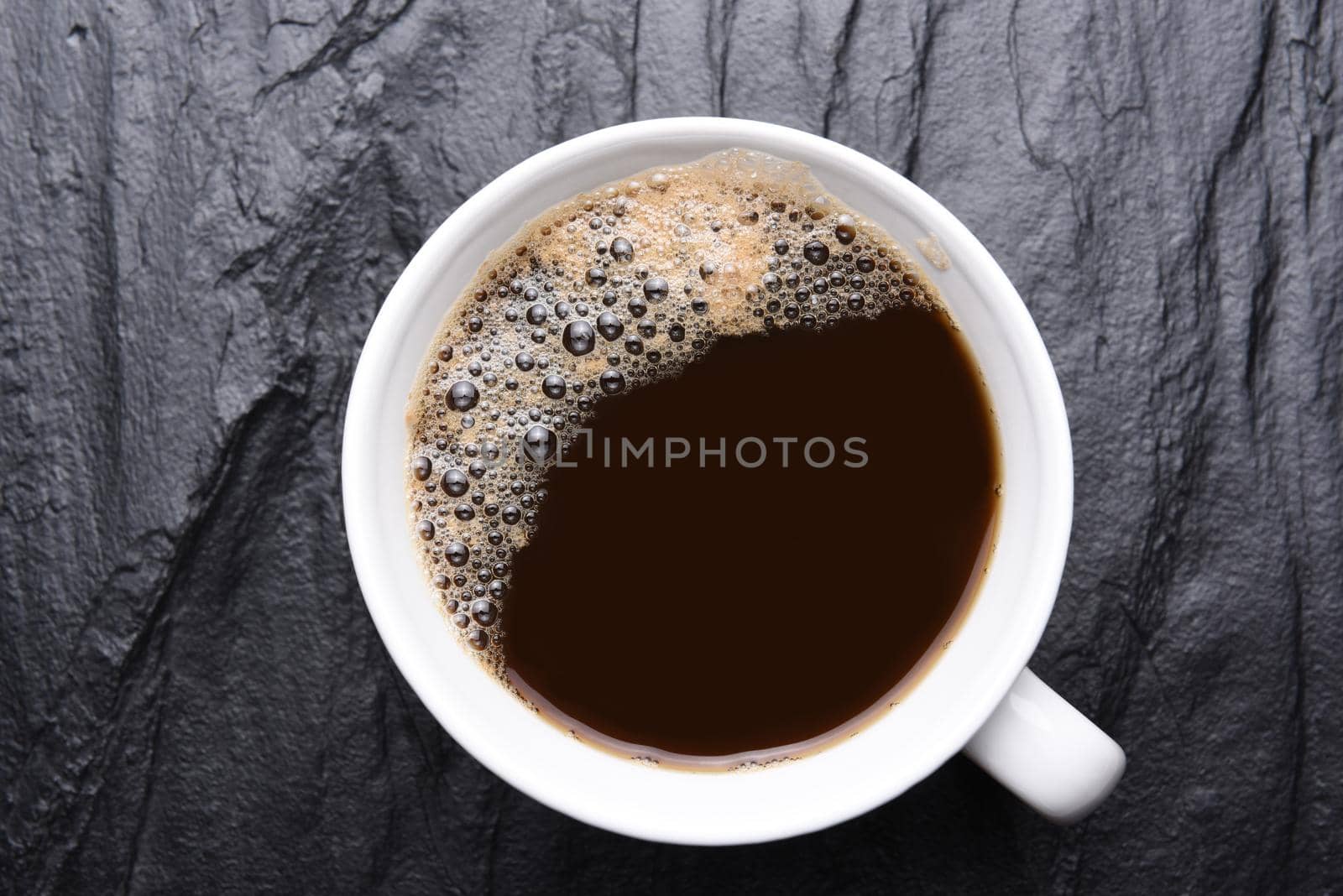 Black Coffee on Slate - Top View