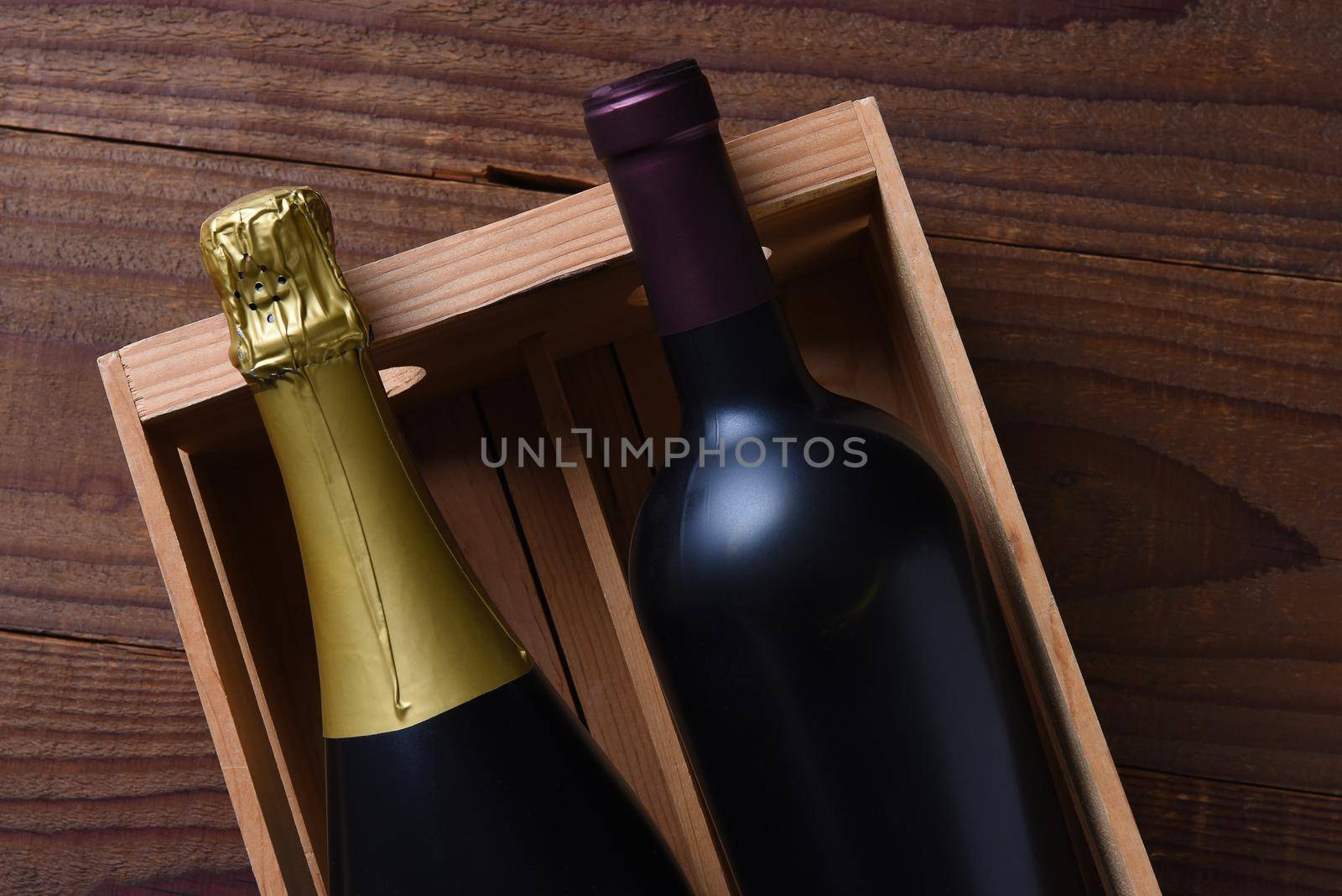 Champagne and Cabernet Sauvignon wine bottle in a wood gift box.