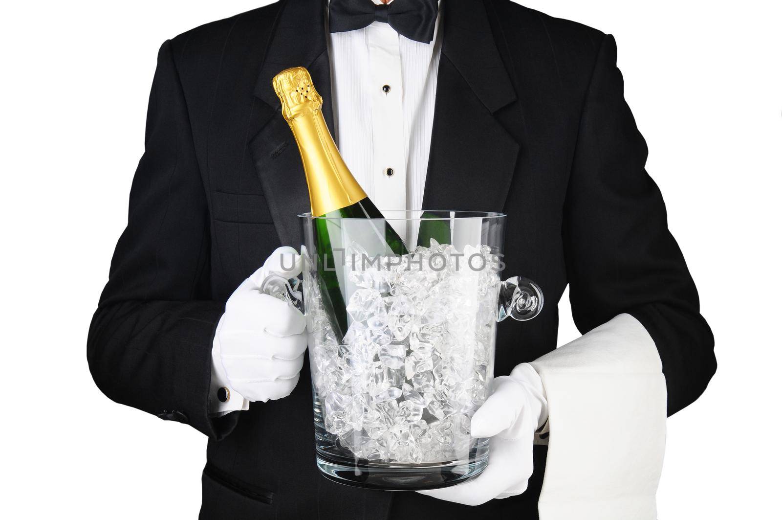Closeup of a Sommelier holding a Champagne Ice Bucket in front of his torso. Horizontal format on white.