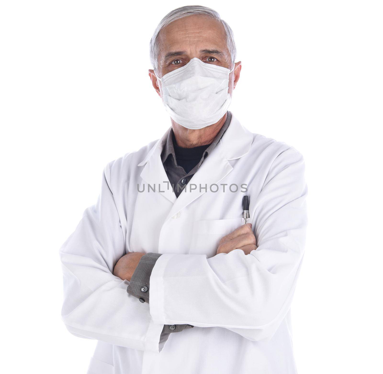 Doctor wearing lab coat and surgical mask with his arm folded isolated on white.  by sCukrov