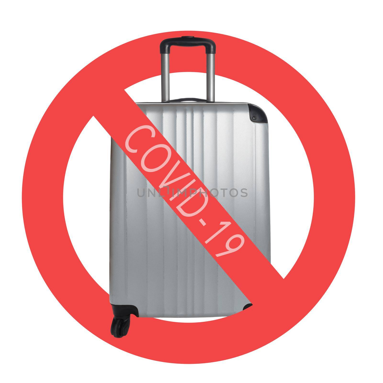 Silver Suitcase on a white background with international no symbol and COVID-19. Cancelled trip tourism restrictions concept during pandemic.