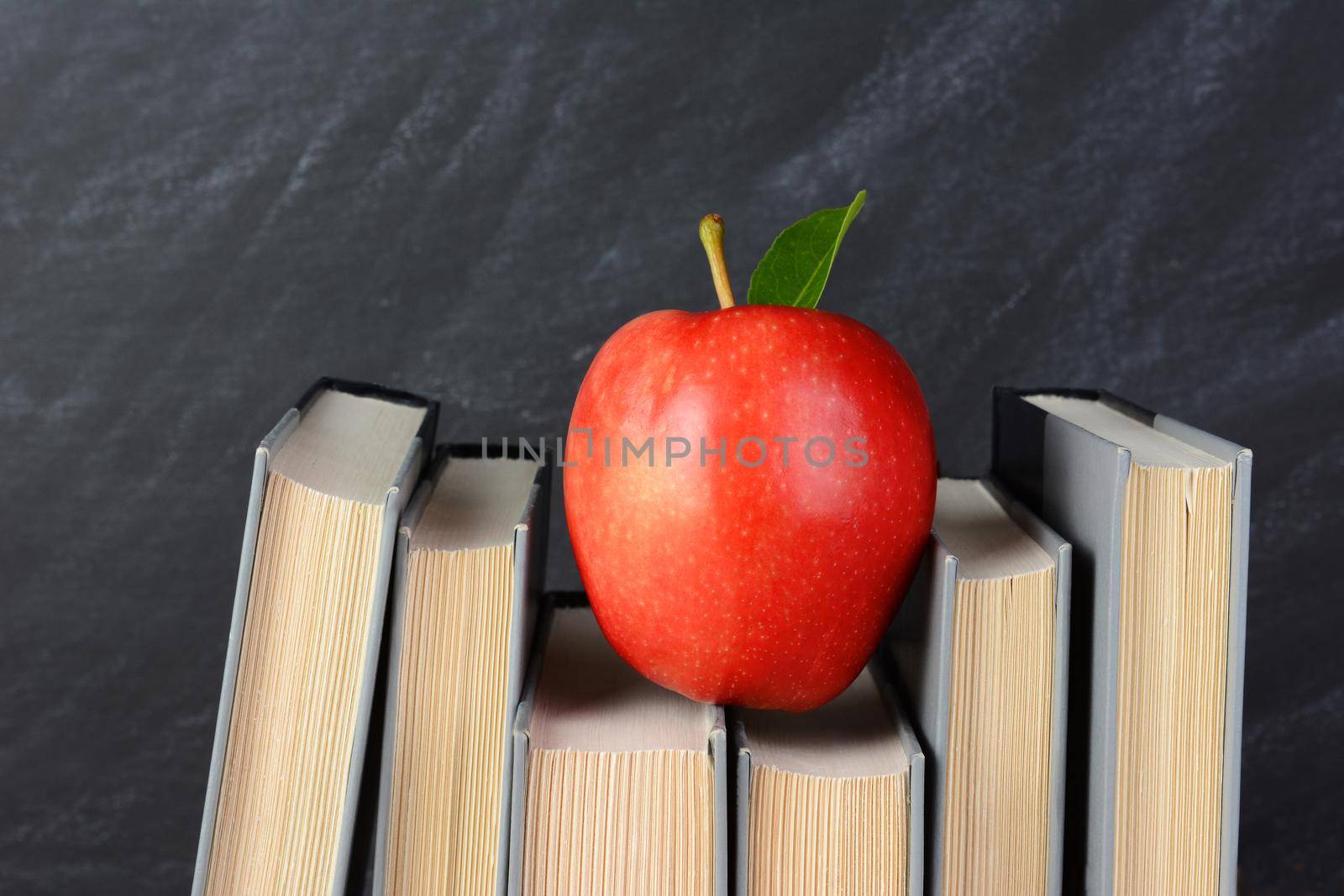 Red Apple on Books by sCukrov