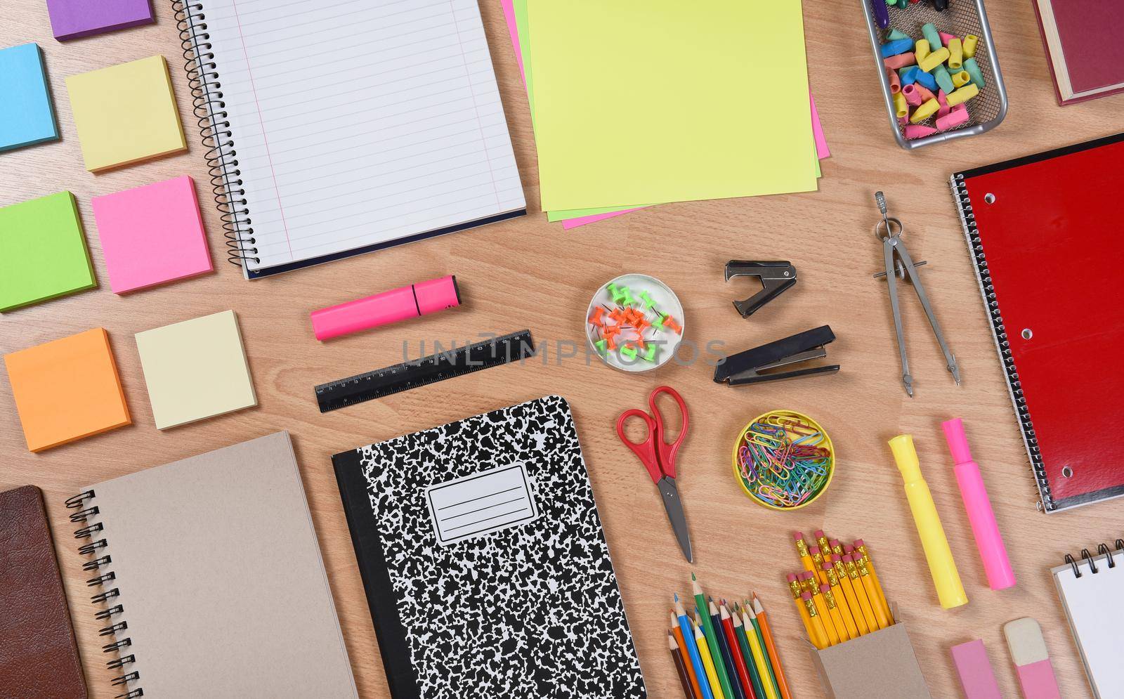 Back to School Supplies on Desk by sCukrov