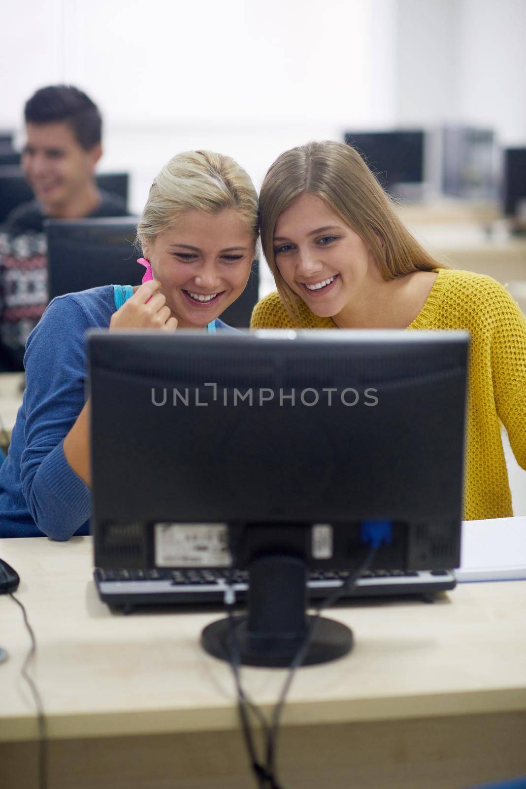 technology students group in computer lab classroom