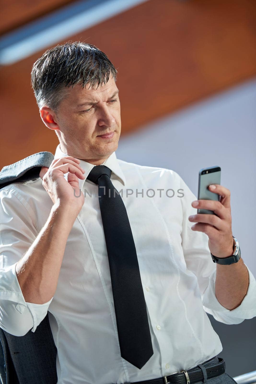 business man using phone by dotshock