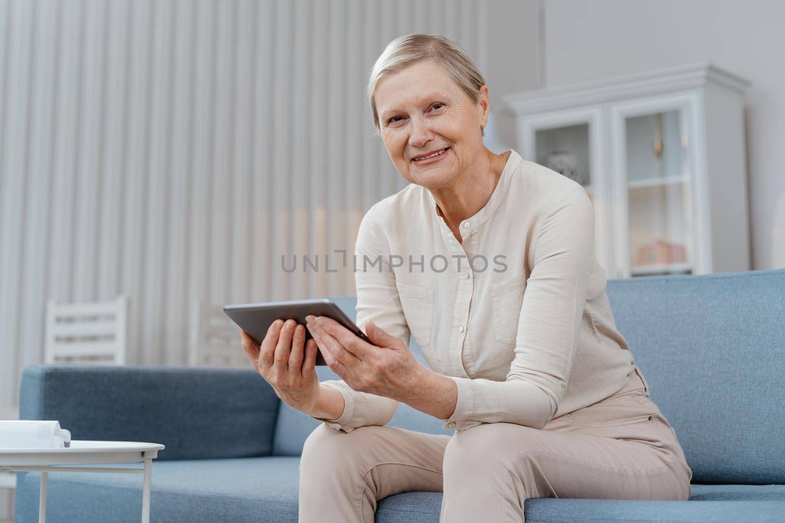 sick woman consulting a doctor by video link. by SmartPhotoLab