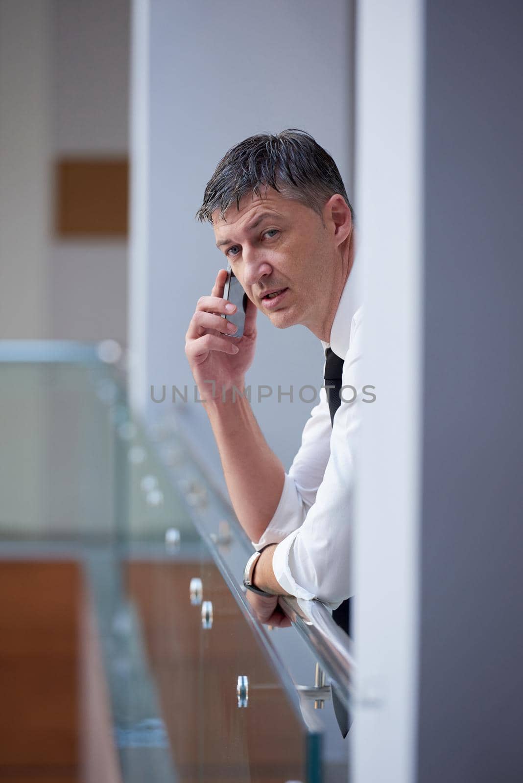 business man using phone by dotshock