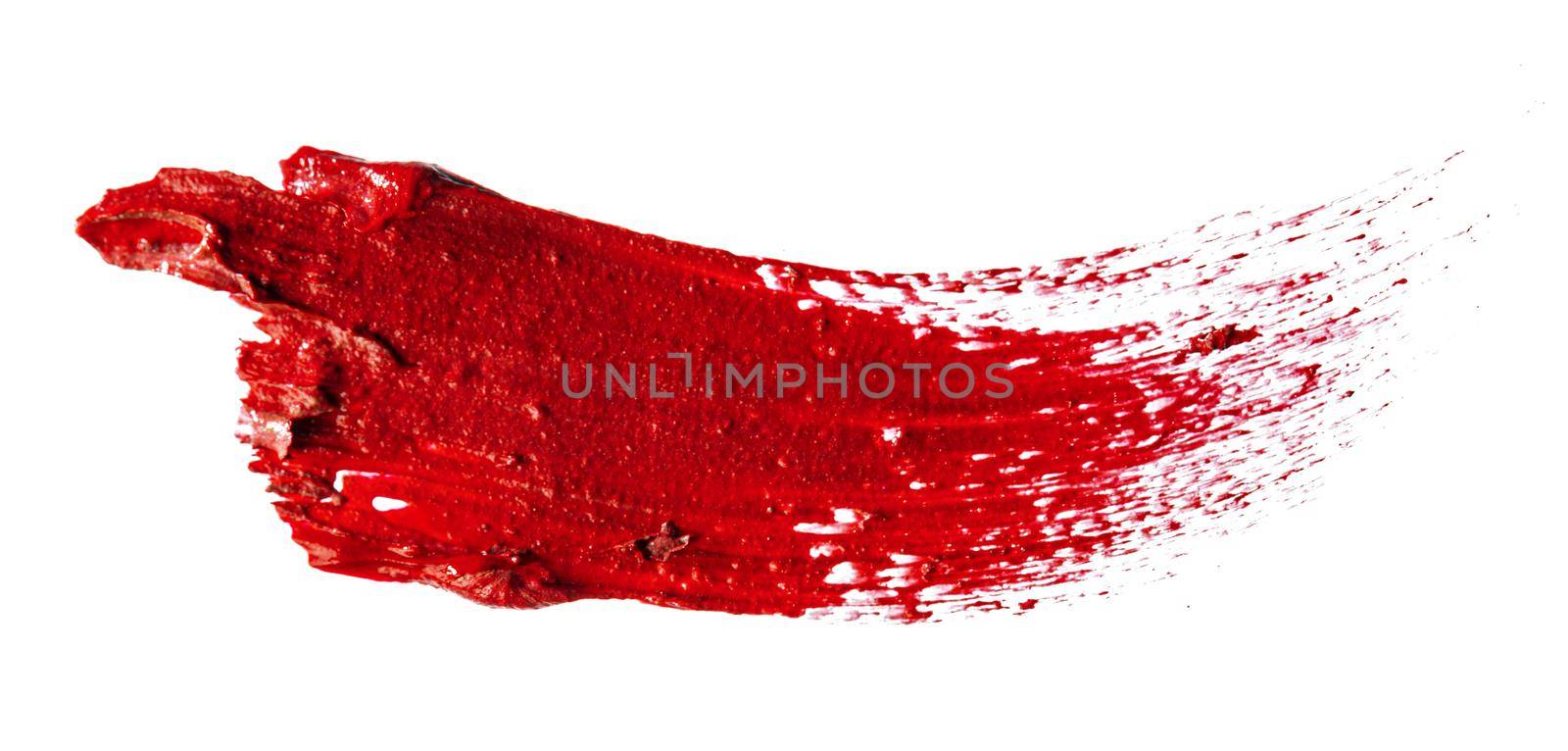 Stain swatch of a red matte lipstick on white background by Fabrikasimf