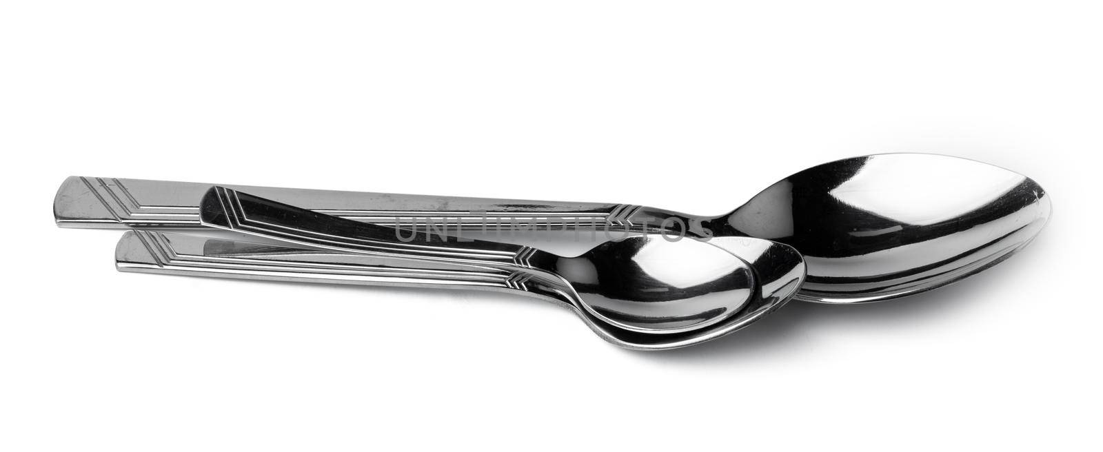 Set of silver spoons cutlery isolated on white background