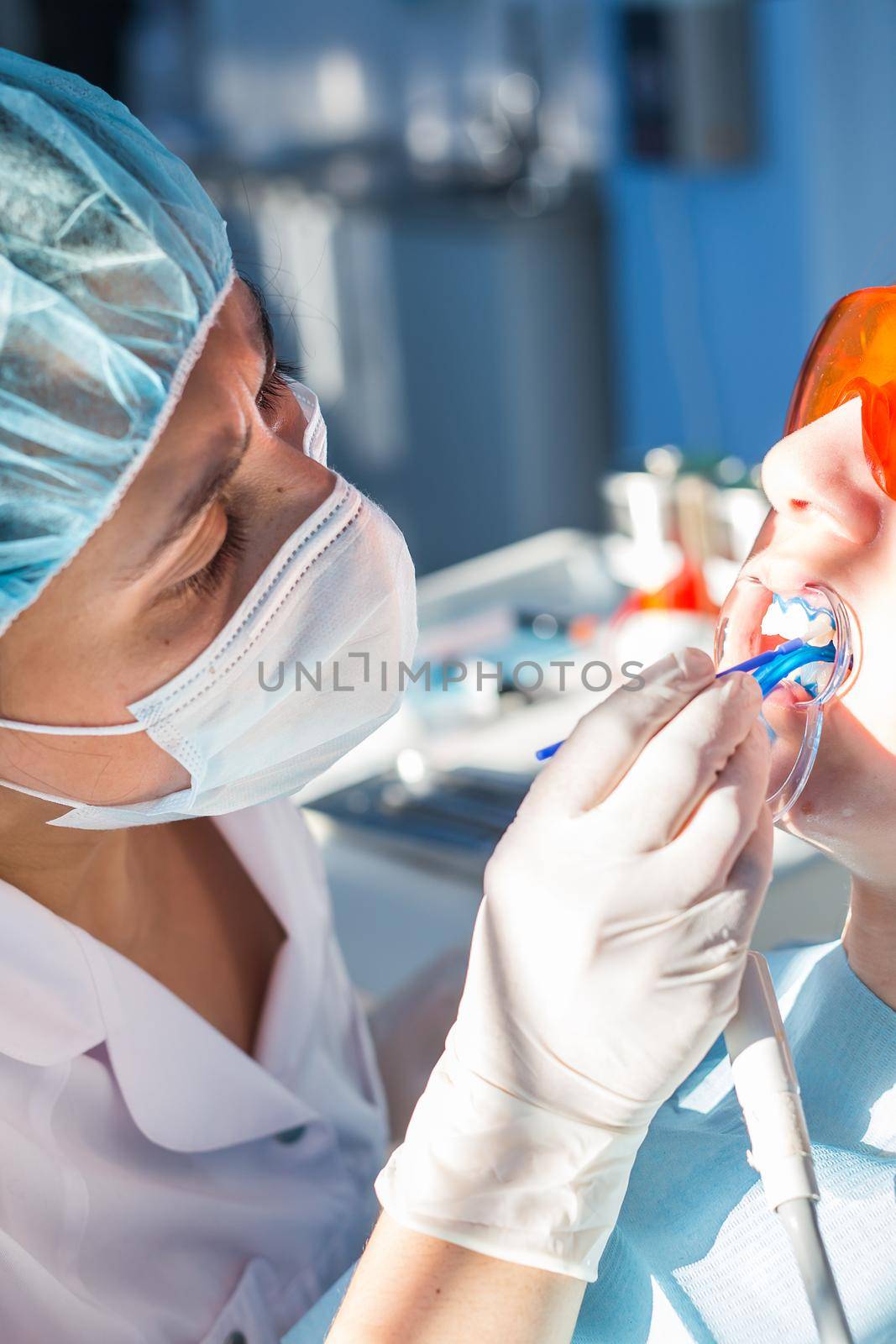 Teeth whitening procedure in the dental clinic