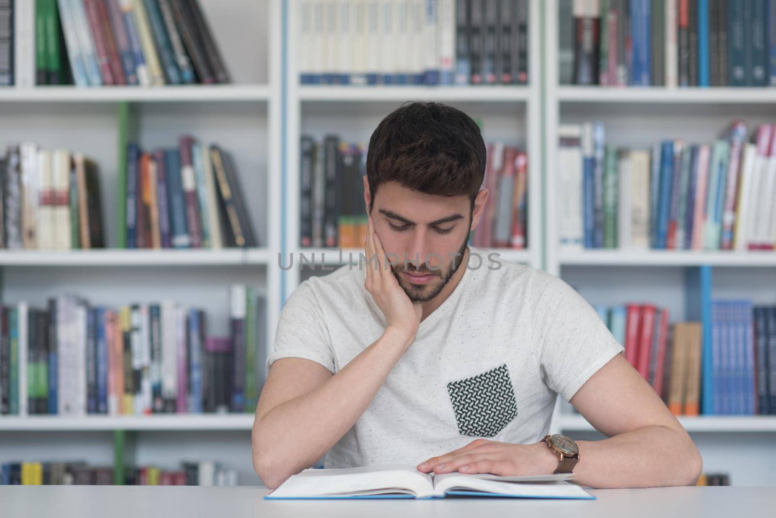 student study  in school library by dotshock