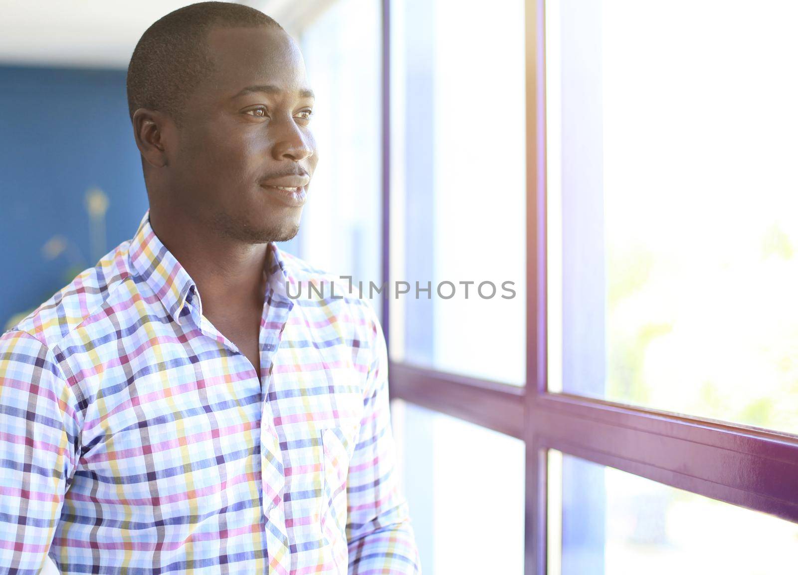 Portrait of a successful confident african businessman by tsyhun