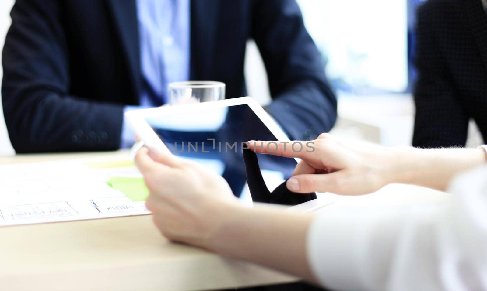 Business adviser analyzing financial figures denoting the progress in the work of the company