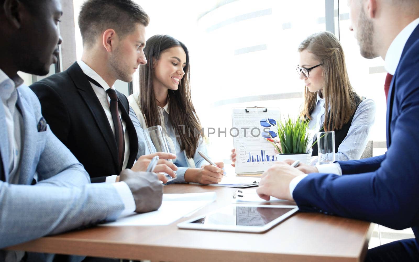 Business adviser analyzing financial figures denoting the progress in the work of the company by tsyhun