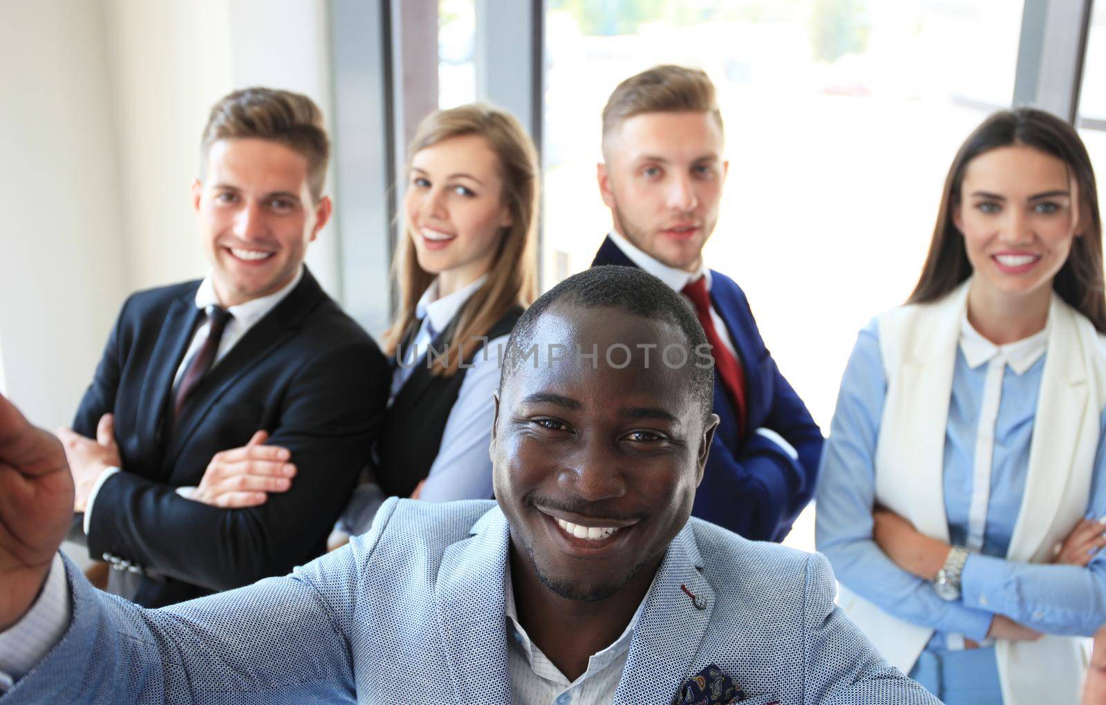 People taking selfie at business meeting