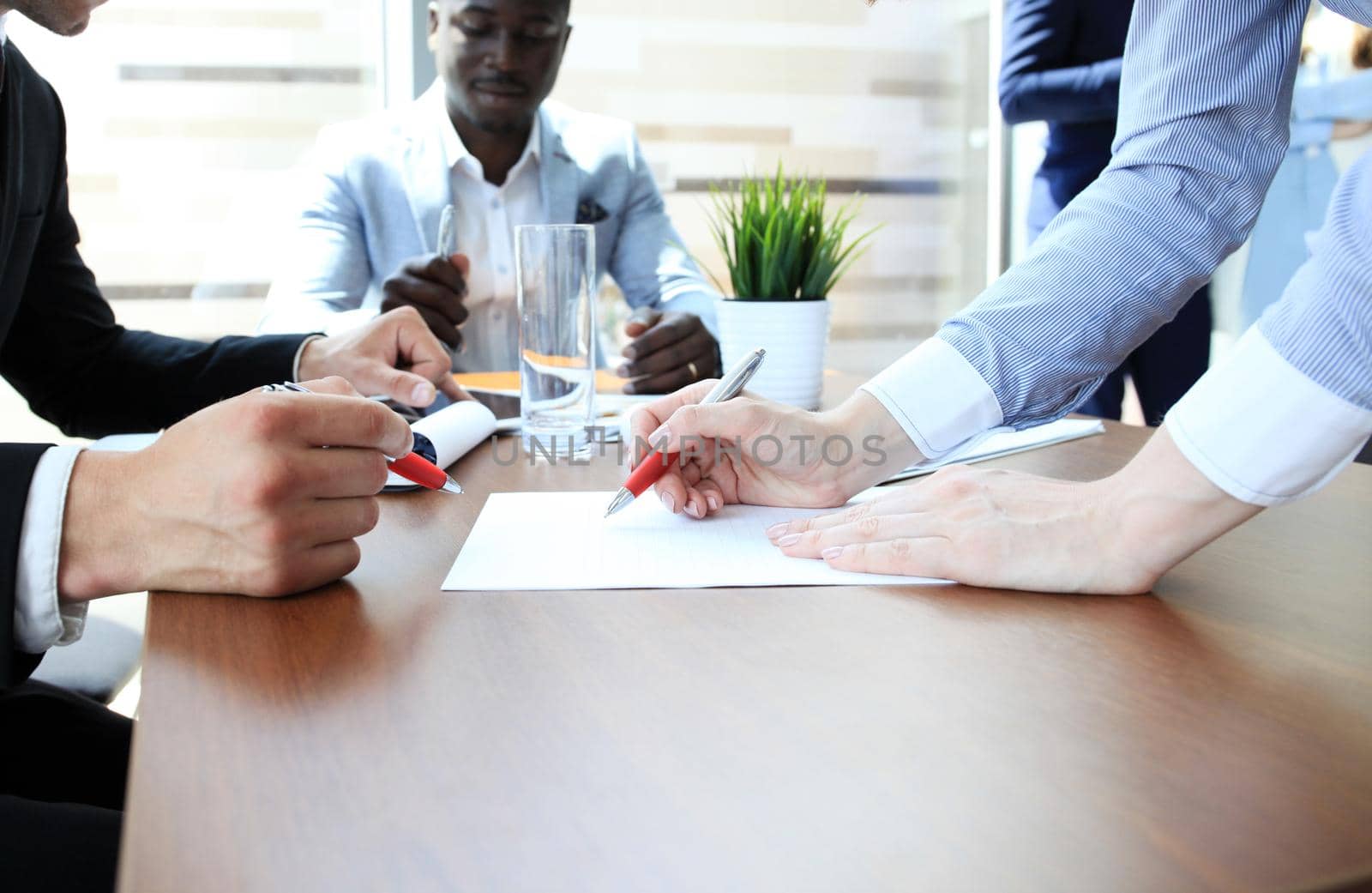 Business adviser analyzing financial figures denoting the progress in the work of the company