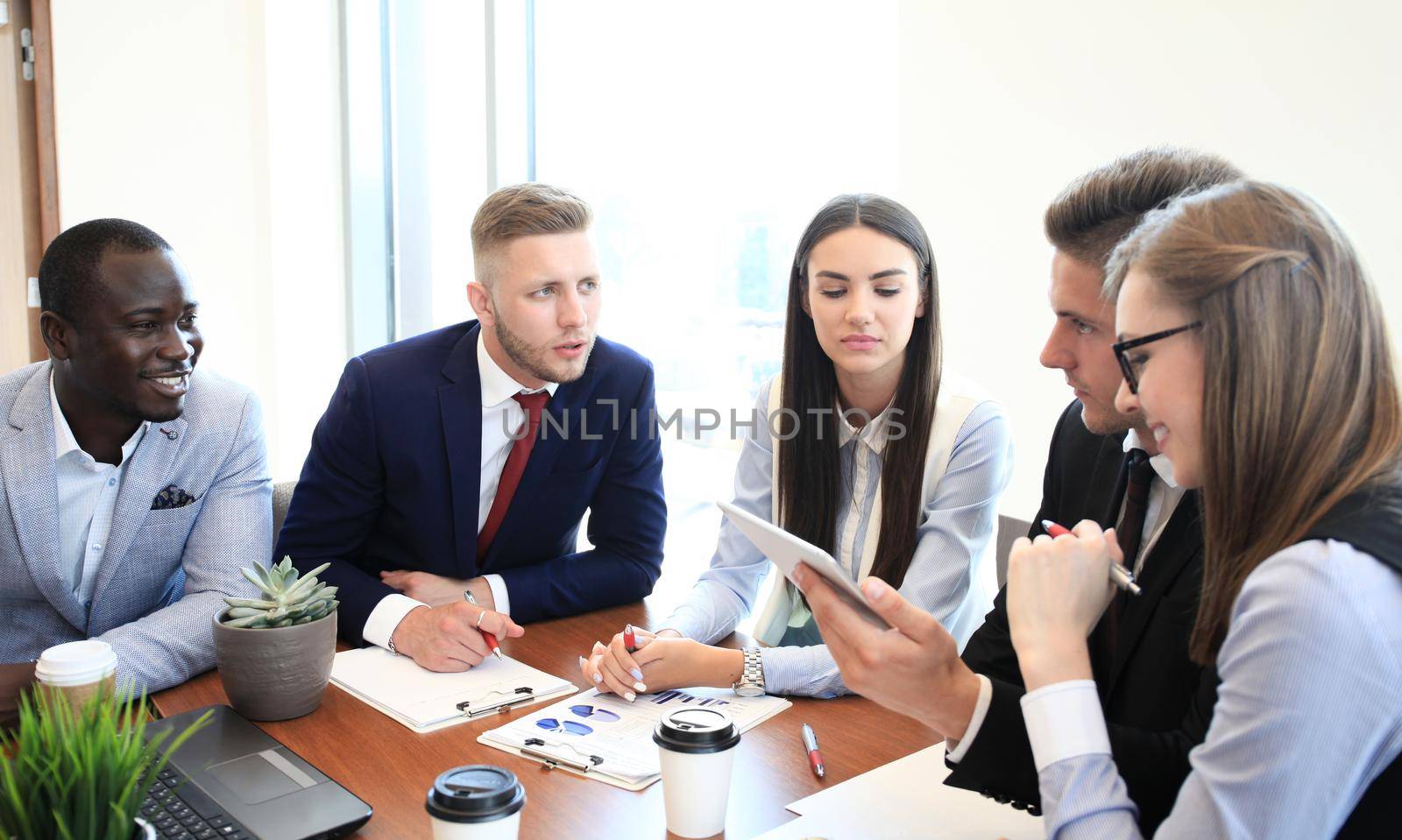 Business adviser analyzing financial figures denoting the progress in the work of the company by tsyhun