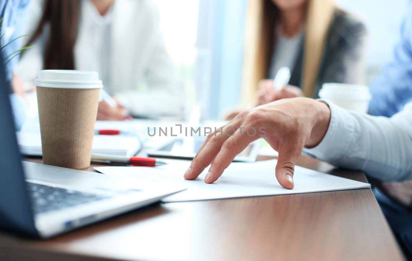 Double exposure of businessman hand working with new modern laptop by tsyhun