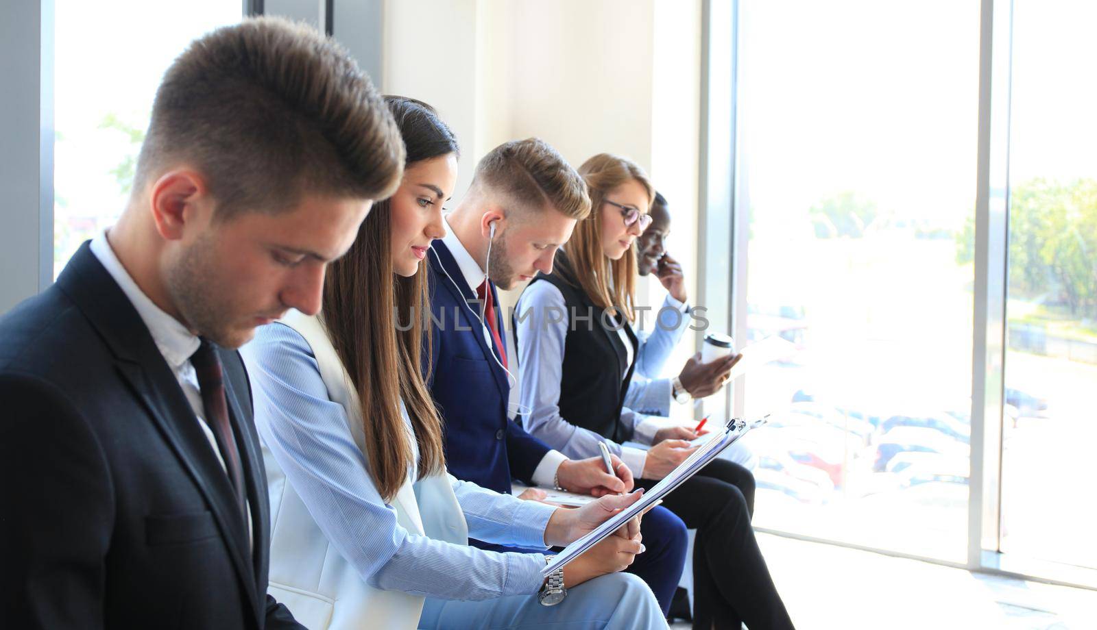 Business people waiting for job interview by tsyhun