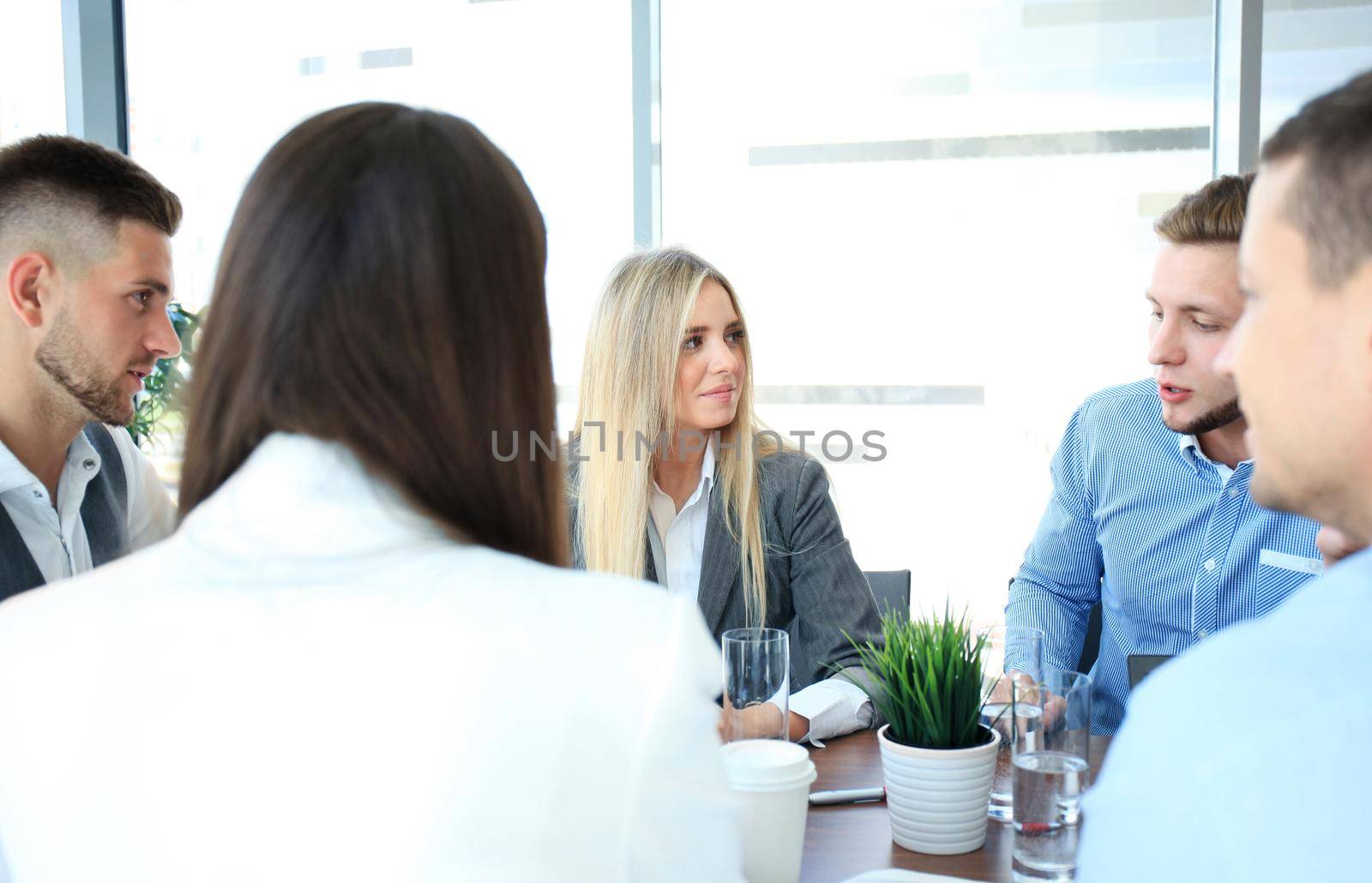 Business people working on new project at modern office