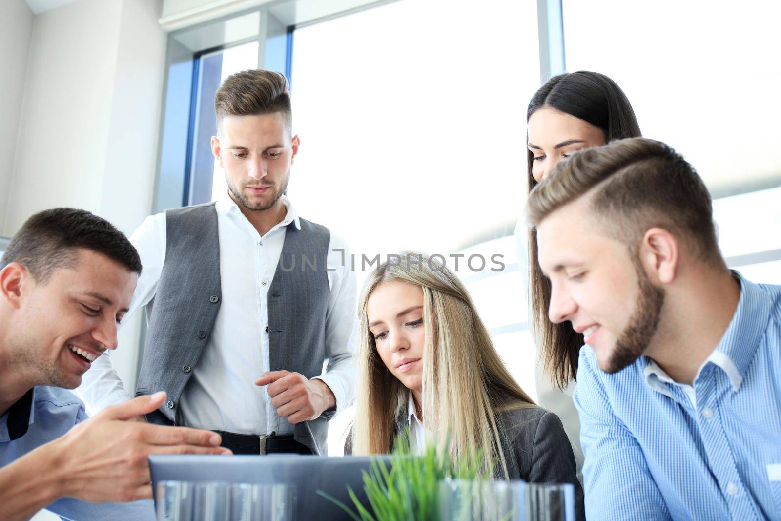 Business people working on new project at modern office