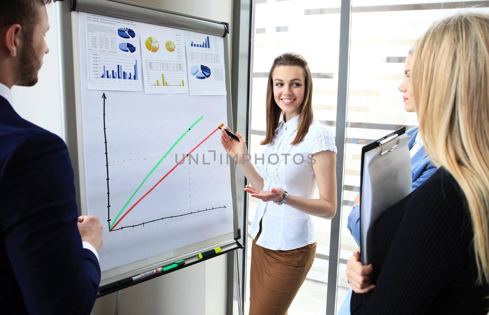 business conference presentation with team training flipchart office