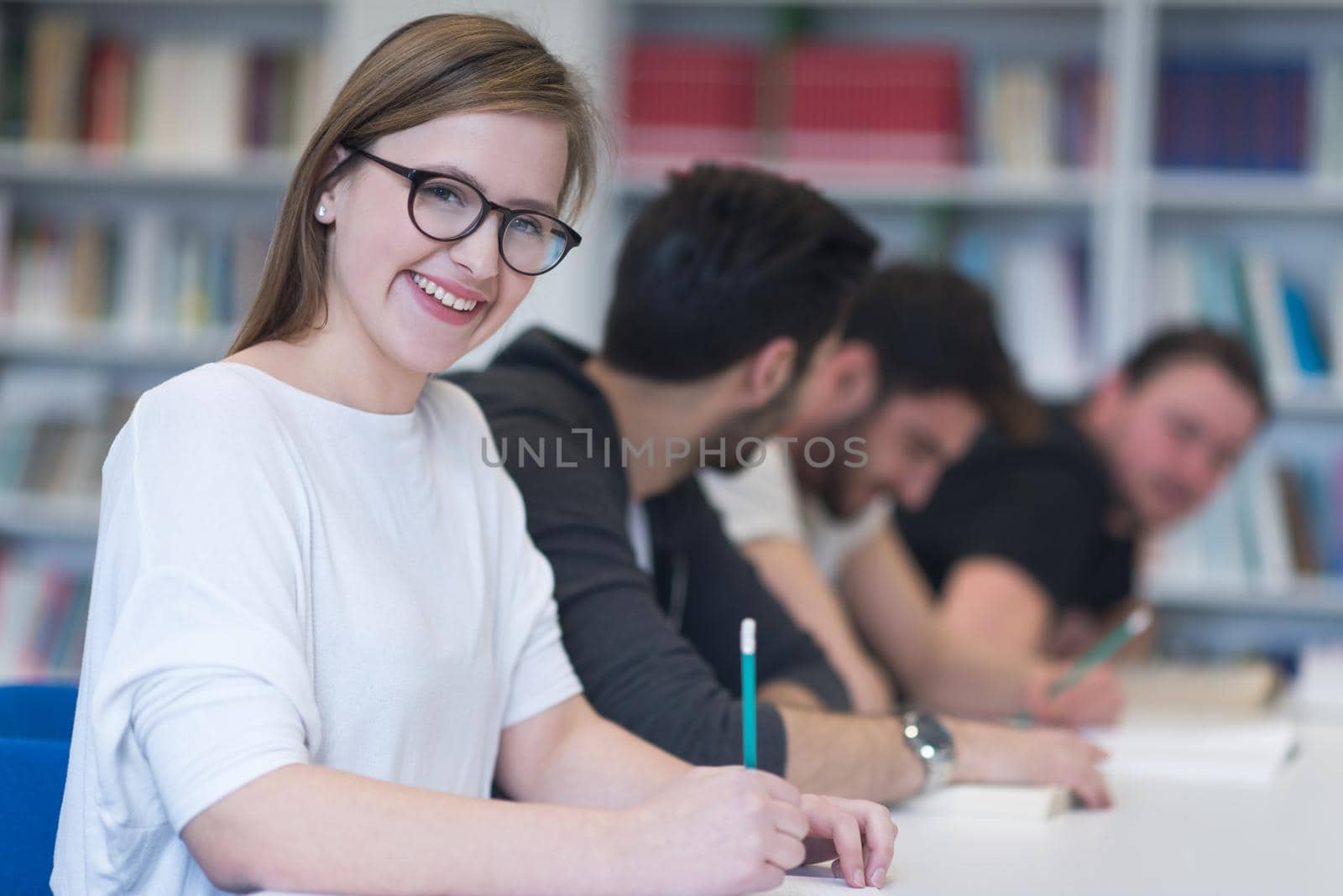 students group study together in school classroom and working together homework project